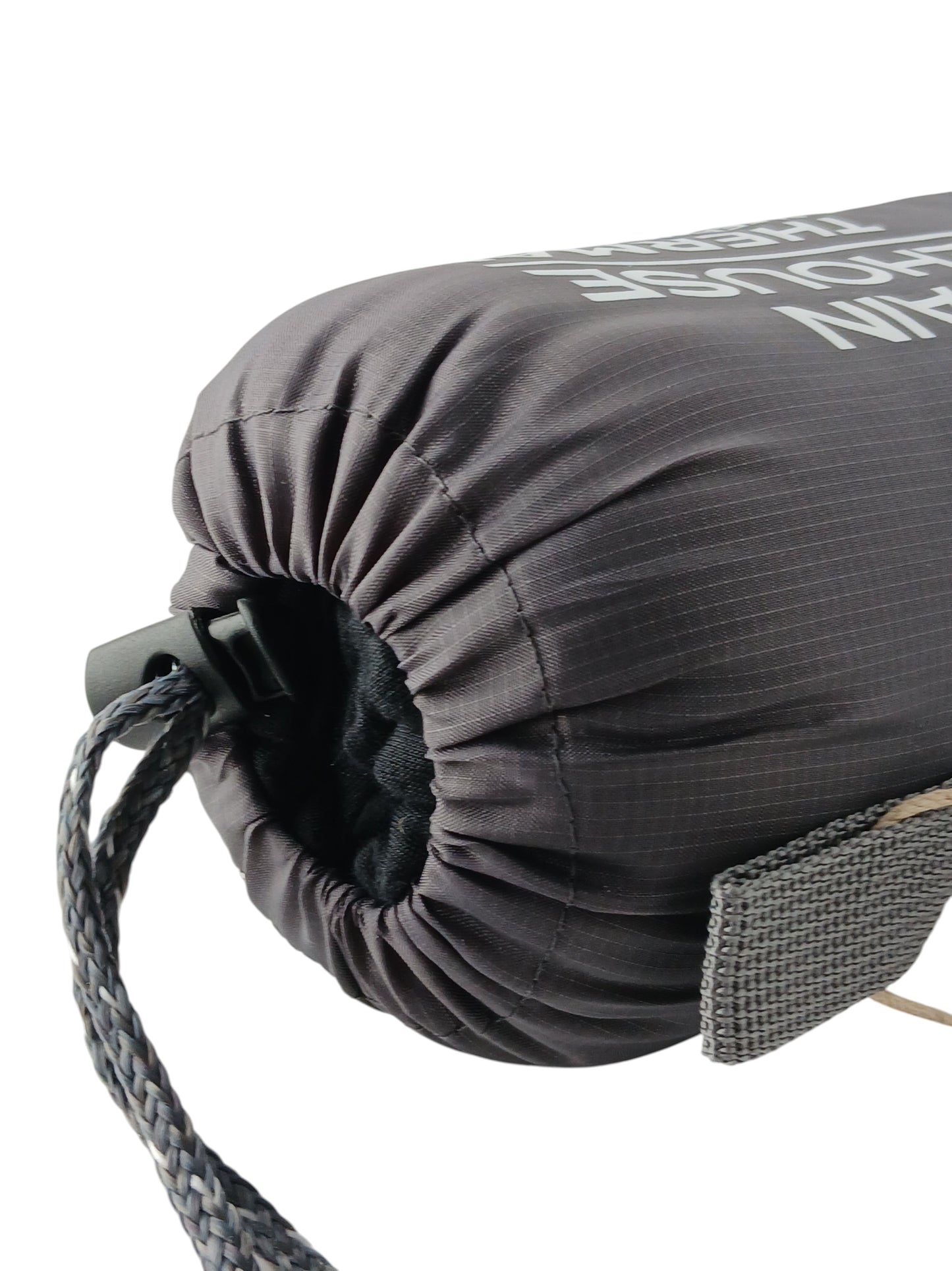 Department Store UK Mountain Warehouse thermal mummy sleeping bag liner in a grey drawstring storage bag