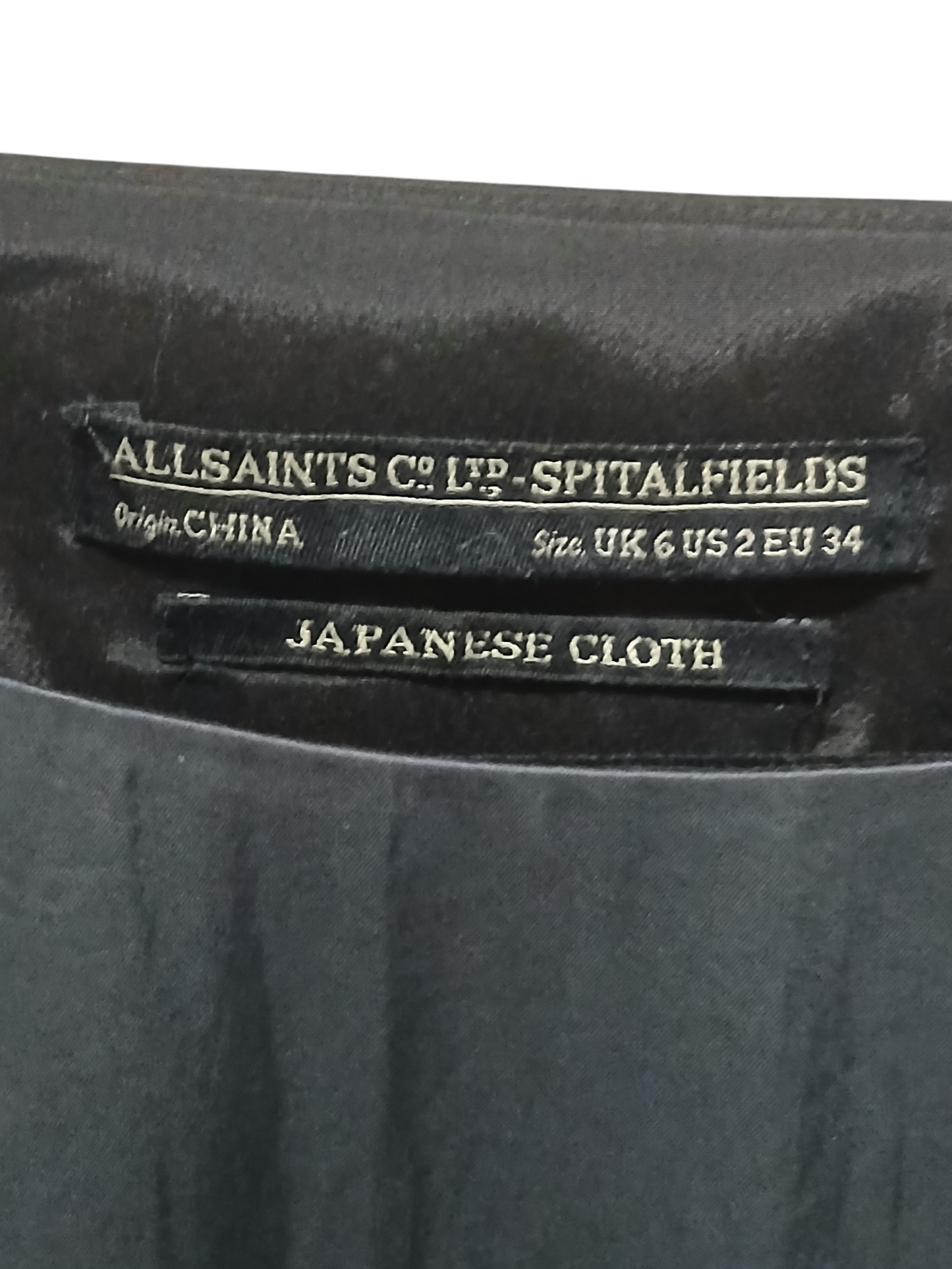 Department Store UK AllSaints Spitalfields dress label showing Japanese cloth construction and size details