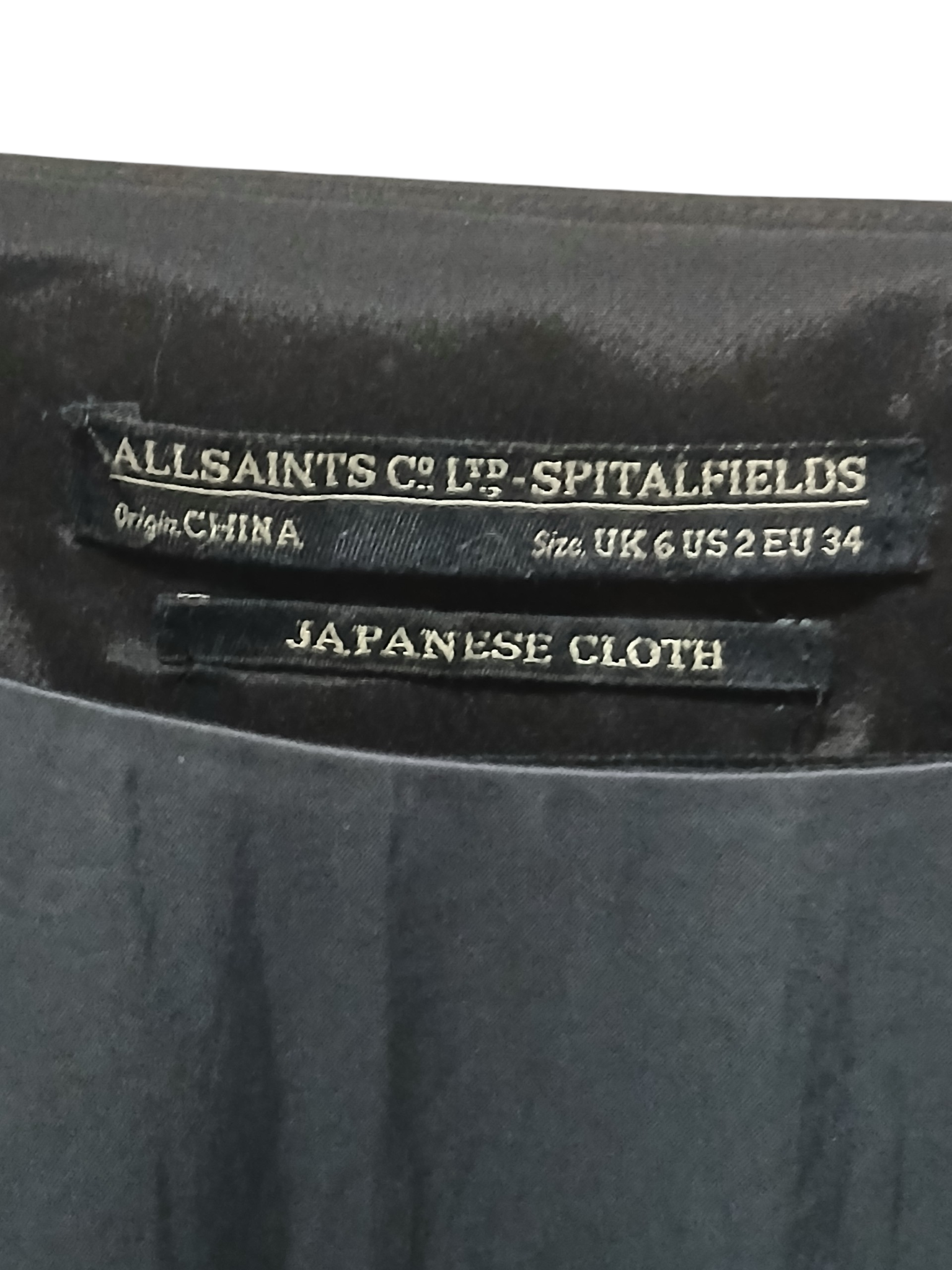 Department Store UK AllSaints Spitalfields dress label showing Japanese cloth construction and size details