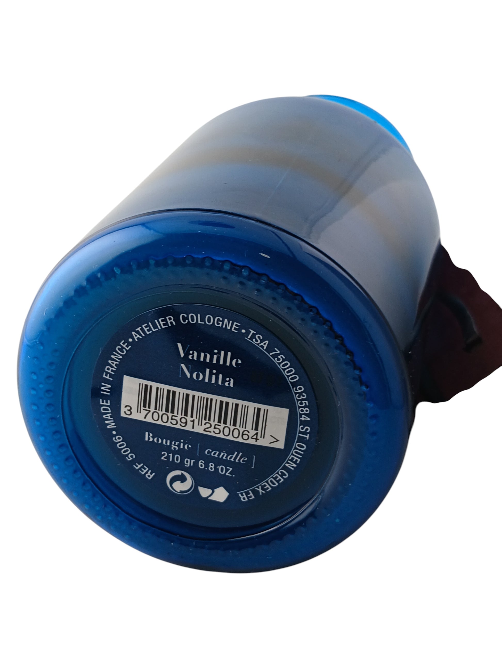 Department Store UK Atelier Cologne Vanille Nolita scented candle base showing product label and blue glass jar