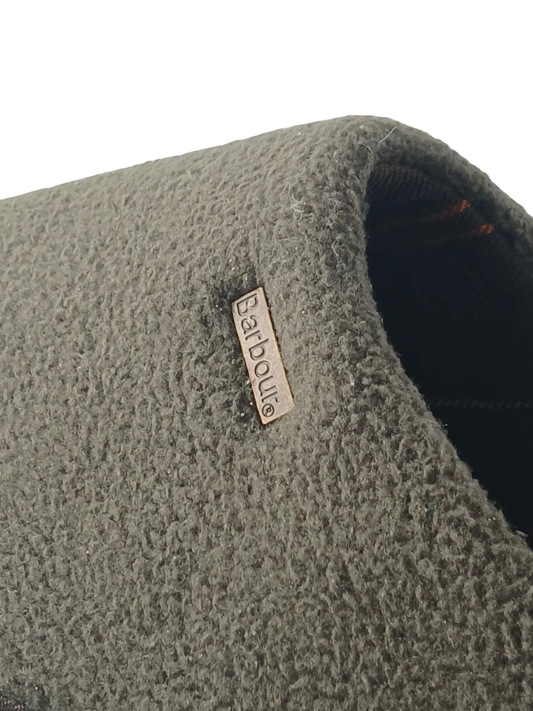 Department Store UK Barbour olive green fleece mule slipper with a metal logo plaque and tartan interior lining