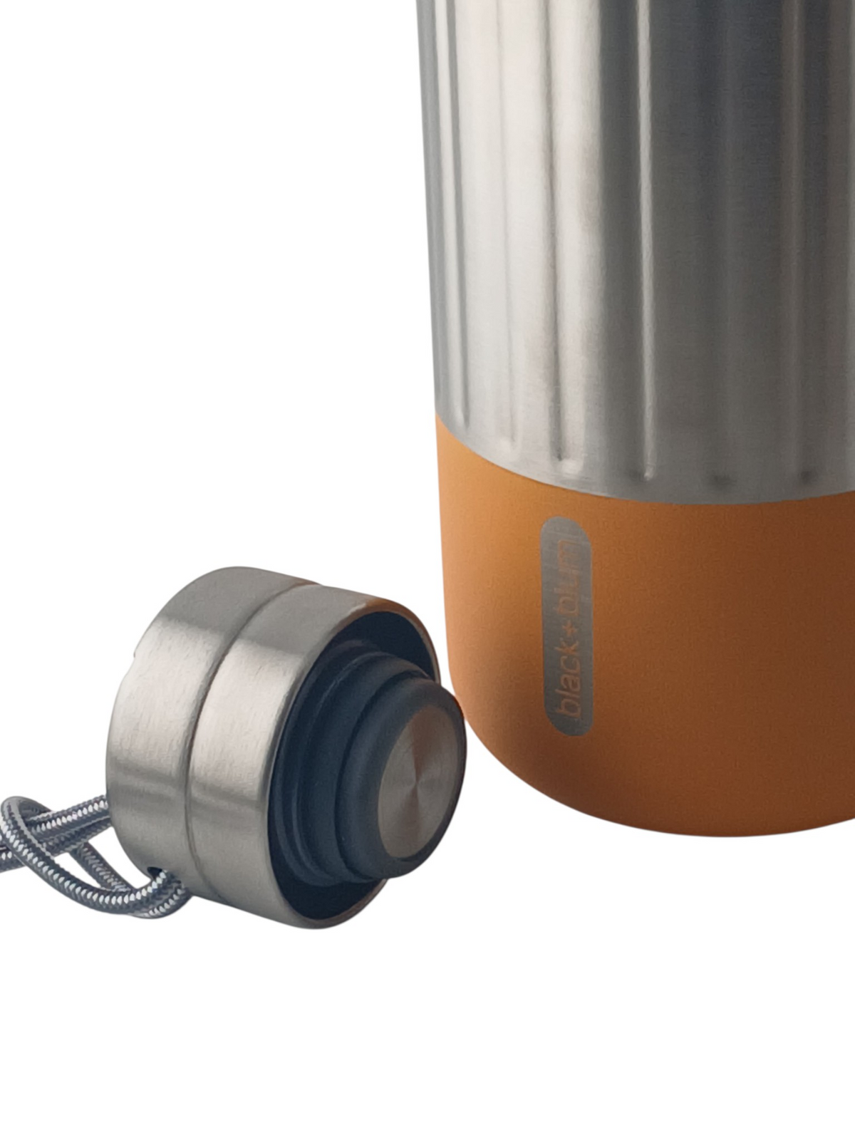 Department Store UK black+blum Explorer stainless steel insulated bottle with an orange silicone base and paracord loop
