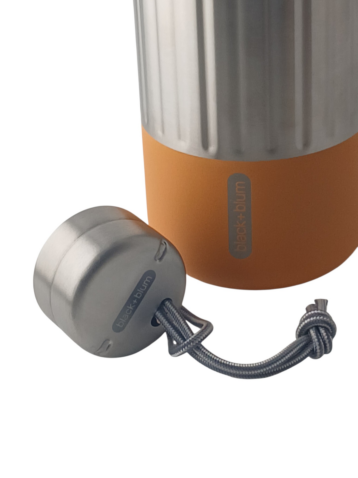 Department Store UK black+blum Explorer insulated stainless steel bottle with orange silicone base and paracord loop