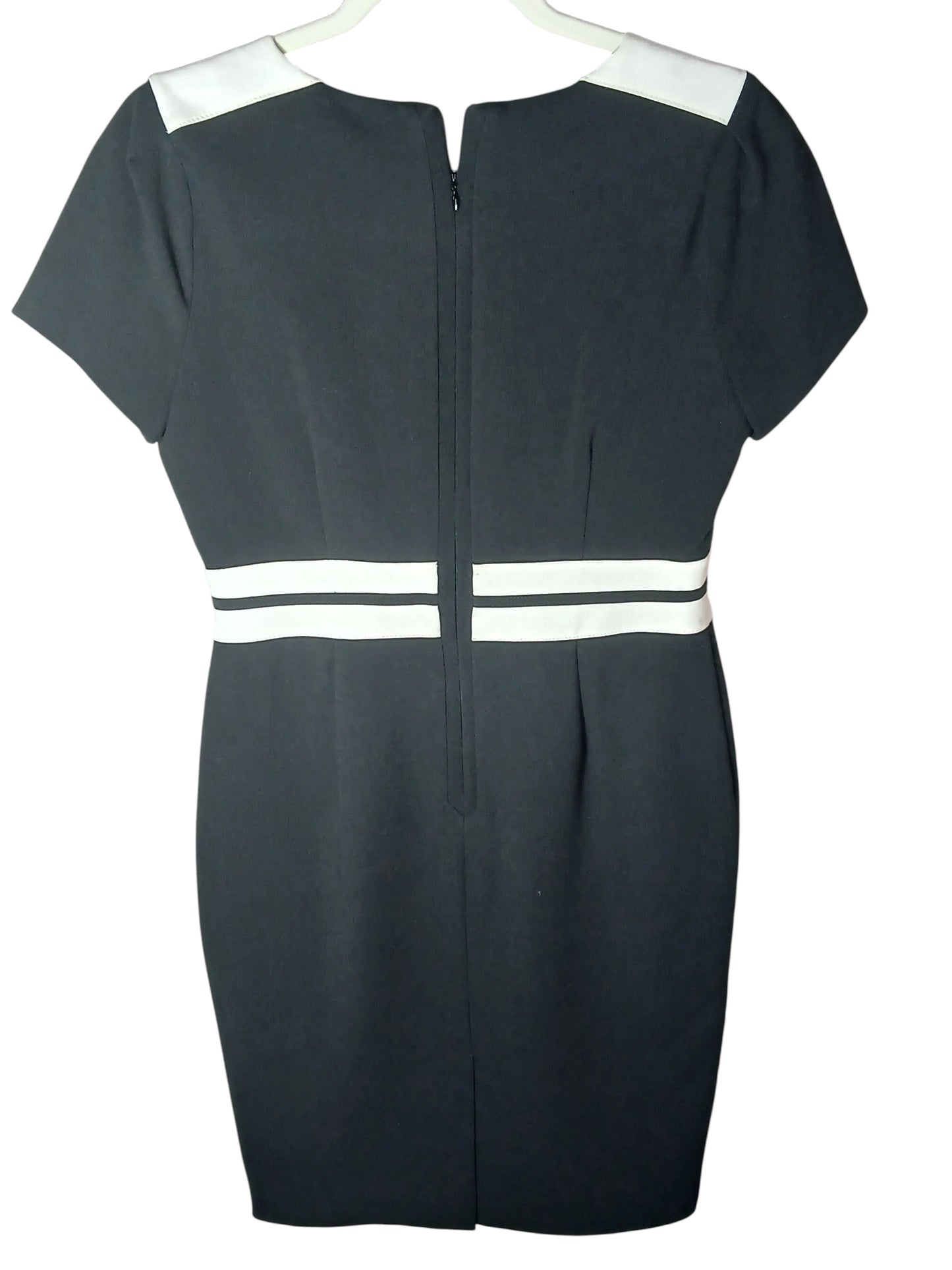 Department Store UK M&S black pencil dress with white shoulder and waist belt detail, knee-length smart workwear.