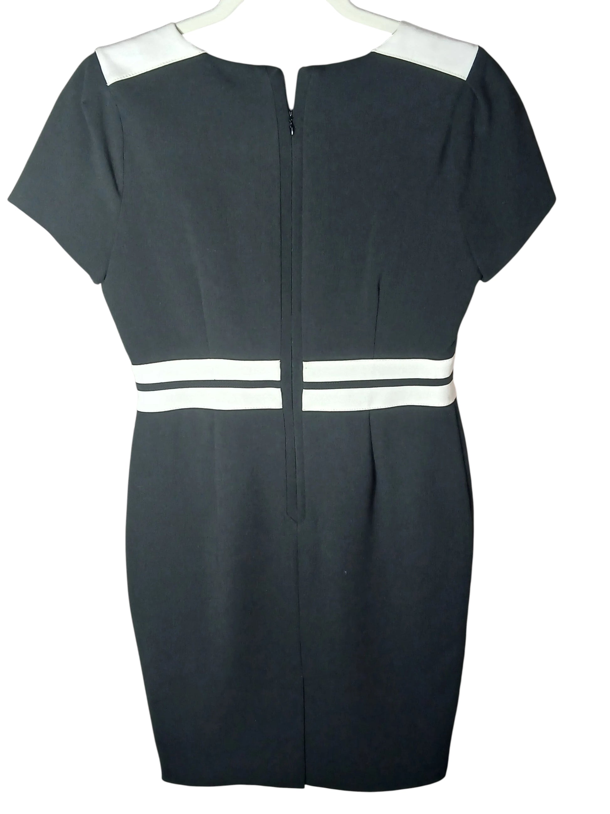 Department Store UK M&S black pencil dress with white shoulder and waist belt detail, knee-length smart workwear.