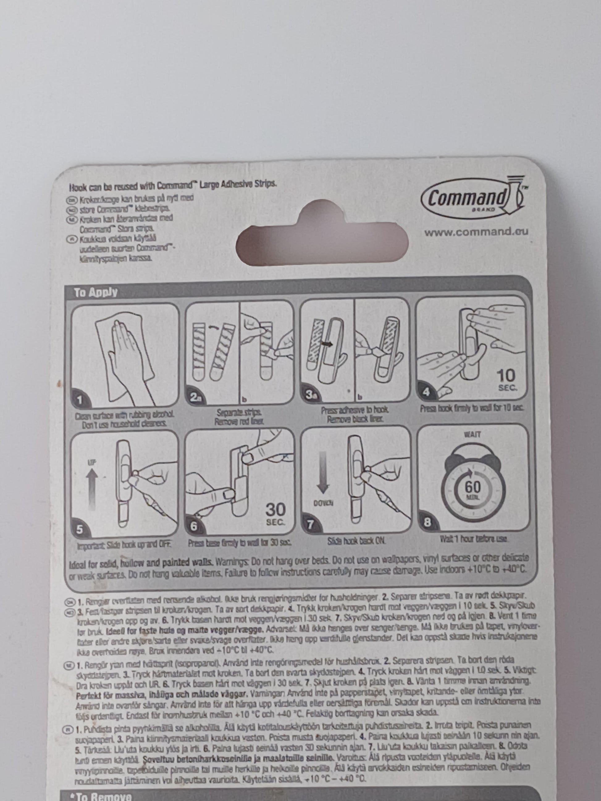 Department Store UK packaging back showing instructions for 3M Command large utility hooks with adhesive strips