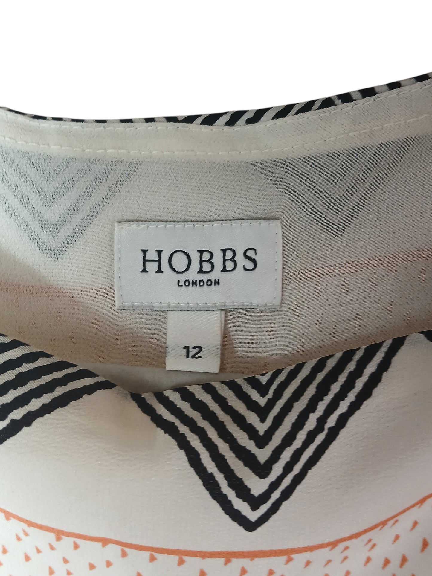 Department Store UK pre-loved HOBBS silk dress with black and white geometric chevron print, size 12 label