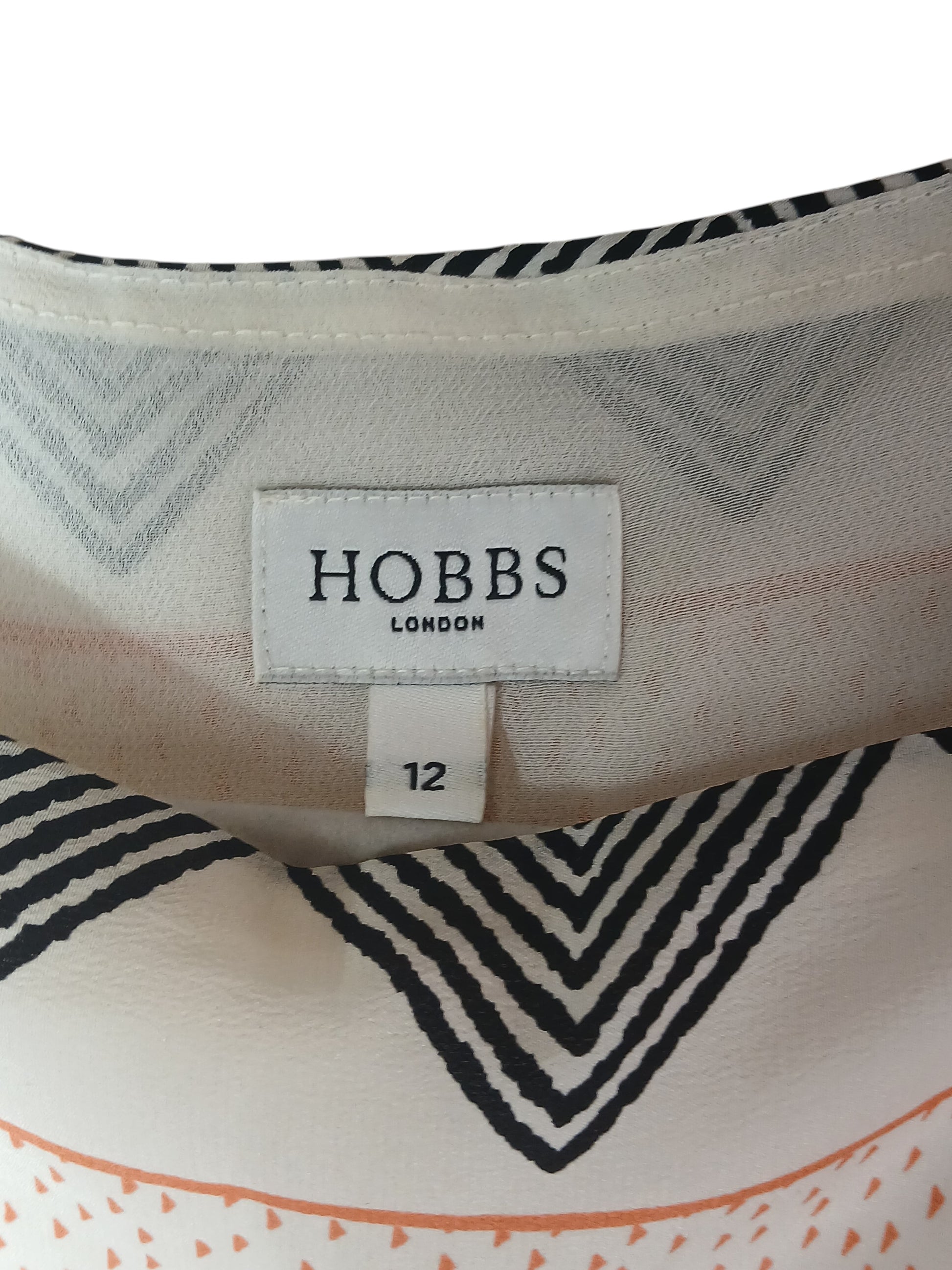 Department Store UK pre-loved HOBBS silk dress with black and white geometric chevron print, size 12 label
