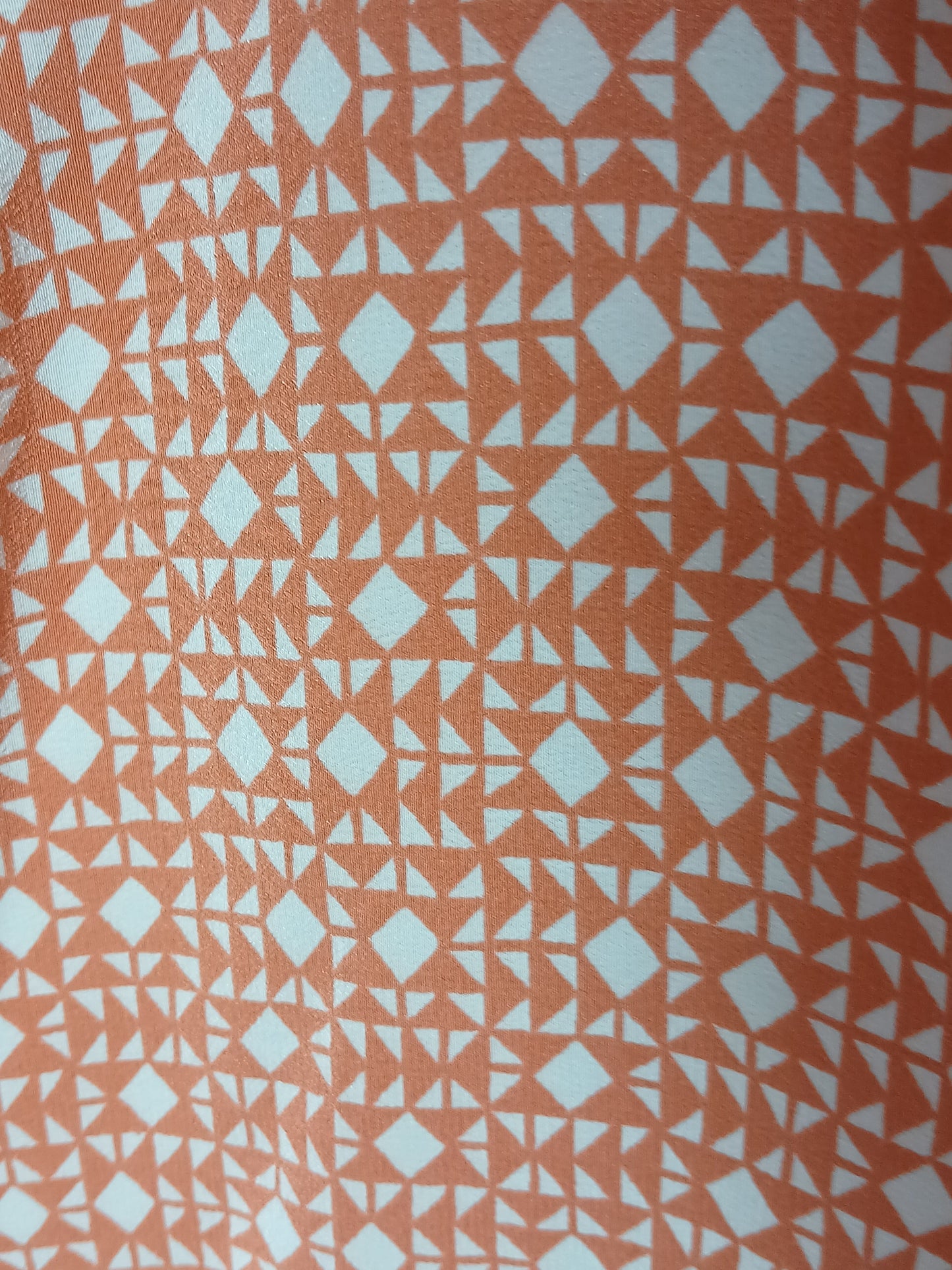 Department Store UK pre-loved HOBBS silk dress featuring a geometric orange and white pattern