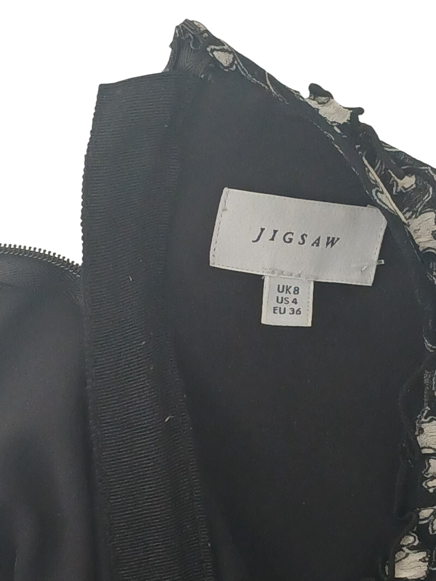 Department Store UK Jigsaw dress label showing size 8 in black and white floral print fabric