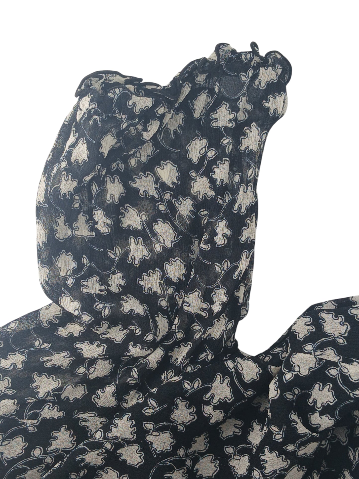 Department Store UK Jigsaw dress in black and cream with a floral pattern and ruffled neckline detail.