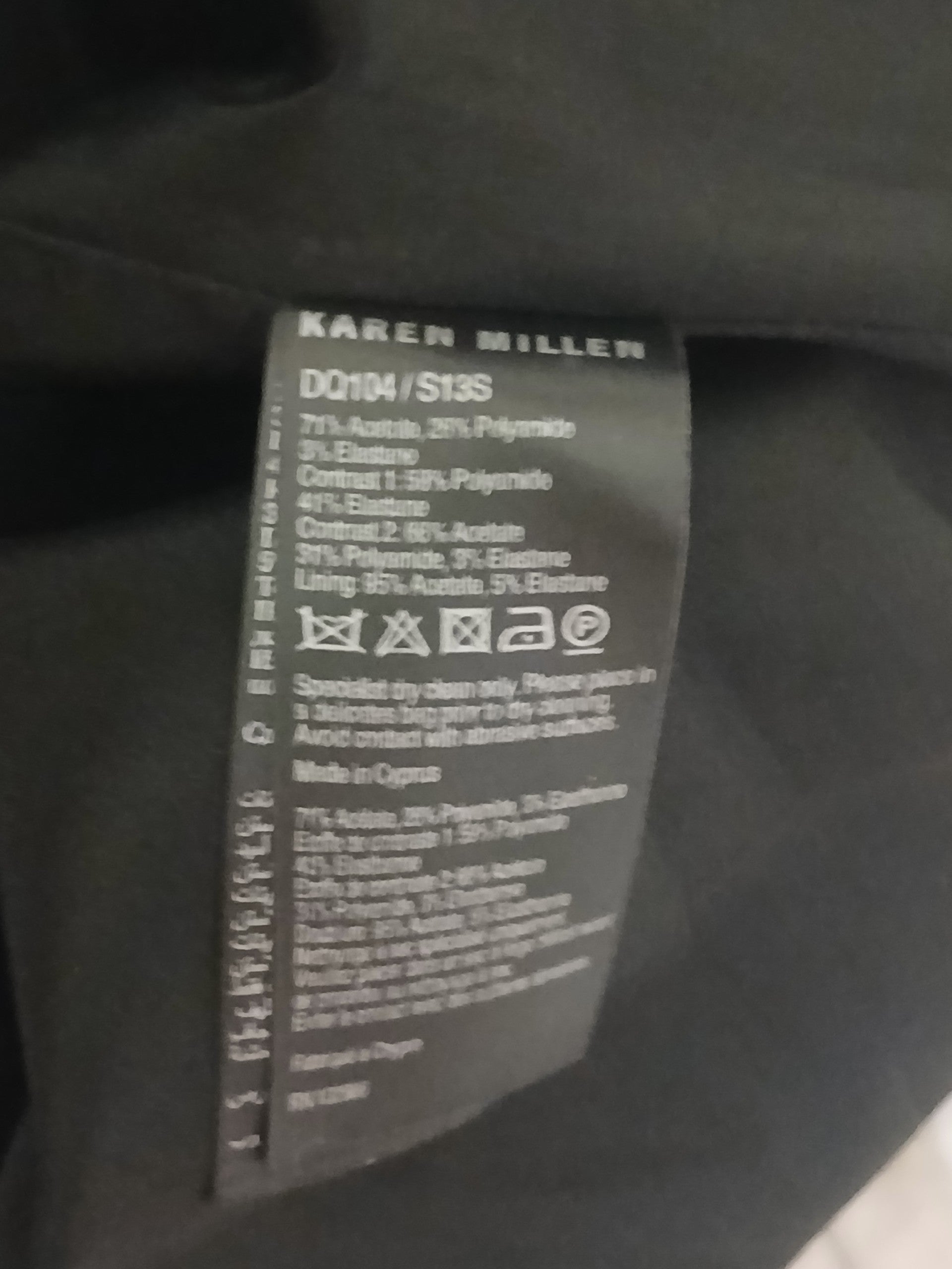 Department Store UK Karen Millen dress care label showing fabric composition and dry clean instructions