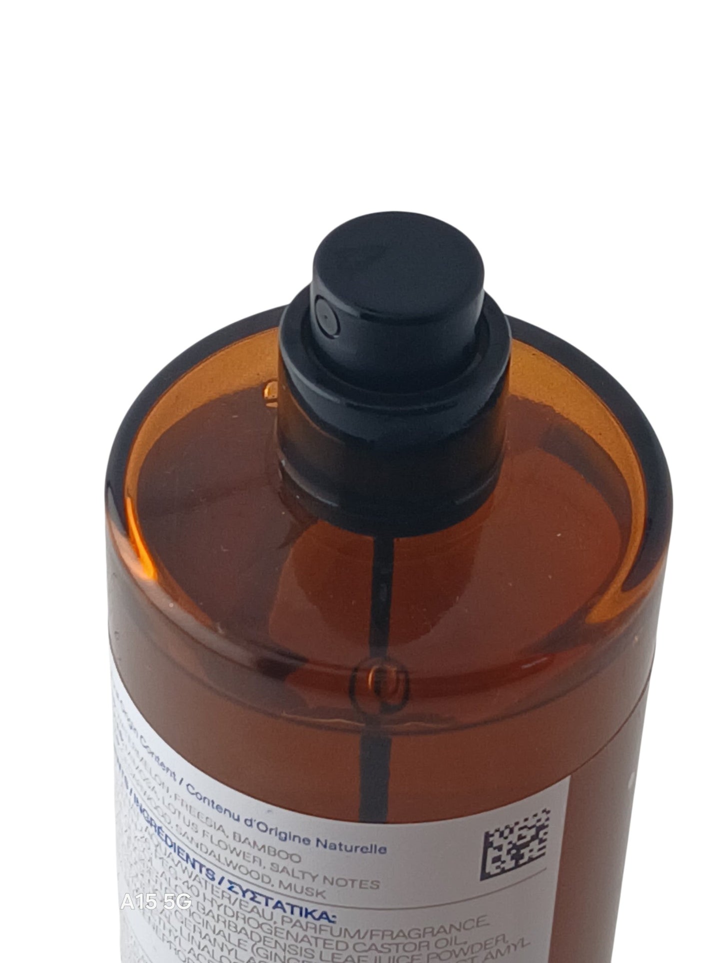 Department Store UK KORRES Sikinos All Body Spray in an amber glass bottle with a black spray nozzle.