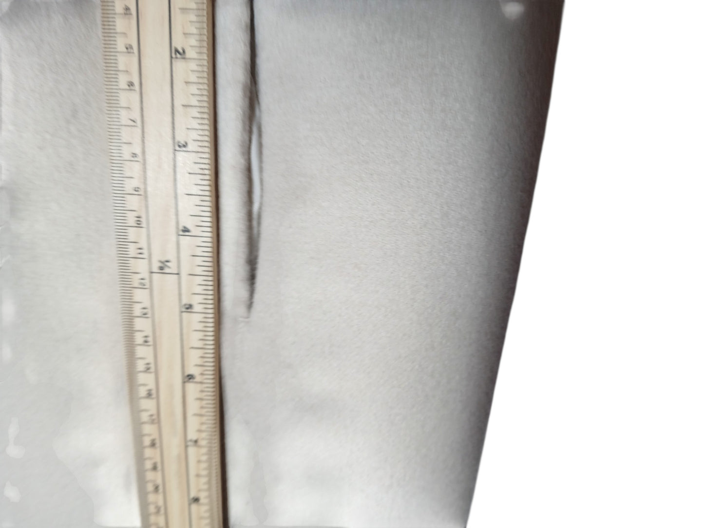 Department Store UK 'S Max Mara pure wool dress detail showing fabric texture and measurement with a wooden ruler