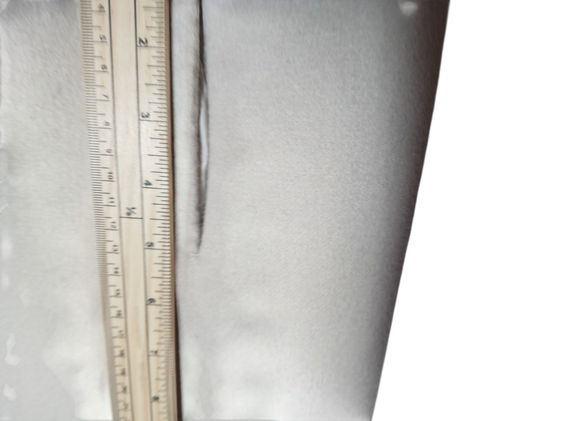Department Store UK 'S Max Mara pure wool dress detail showing fabric texture and measurement with a wooden ruler