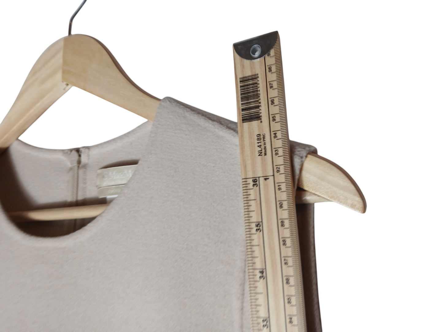 Department Store UK pre-loved 'S Max Mara beige pure wool dress on a wooden hanger with a measuring ruler