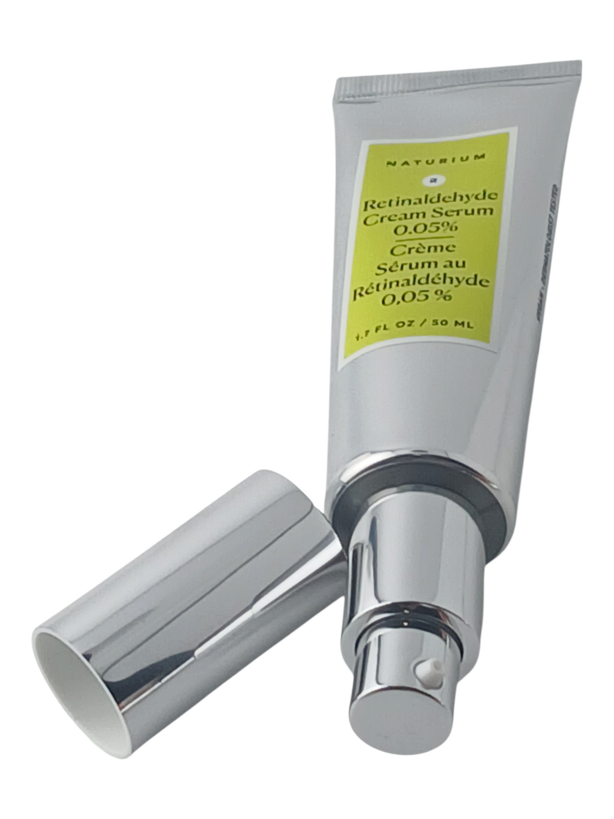 Department Store UK Naturium Retinaldehyde Cream Serum 0.05% in a silver pump tube with a lime green label.