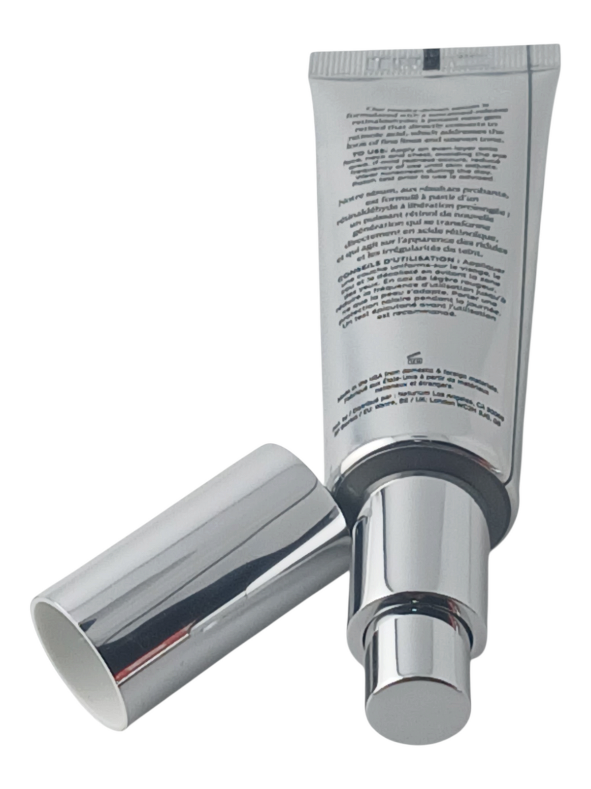 Department Store UK Naturium Retinaldehyde Cream Serum tube with silver cap, featuring anti-ageing skincare formula.