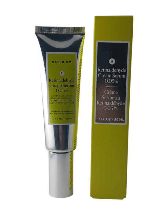 Department Store UK Naturium Retinaldehyde Cream Serum 0.05% in a silver tube and lime green box for anti-ageing