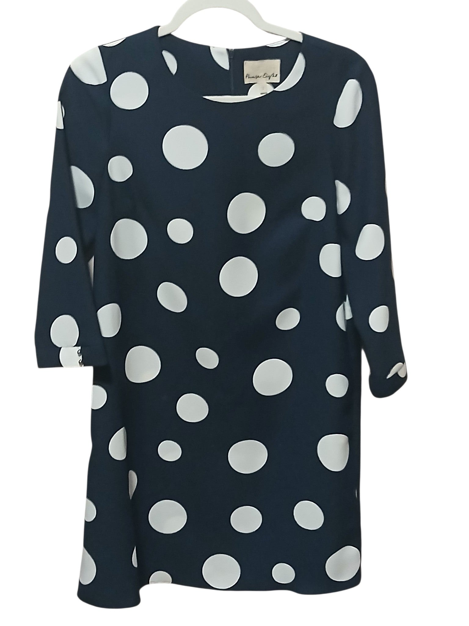 Department Store UK Phase Eight navy blue shift dress with oversized white polka dots and three-quarter sleeves.