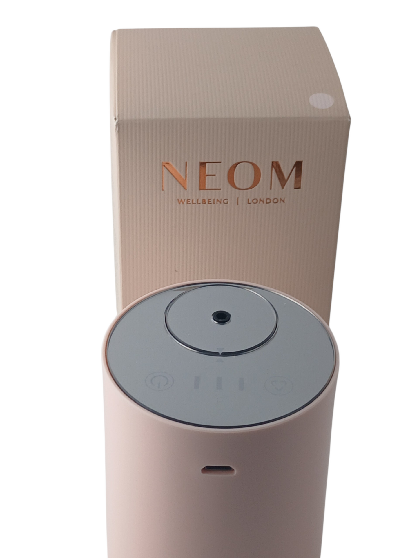 Department Store UK NEOM Wellbeing Pod Mini essential oil diffuser in blush pink with its branded packaging box