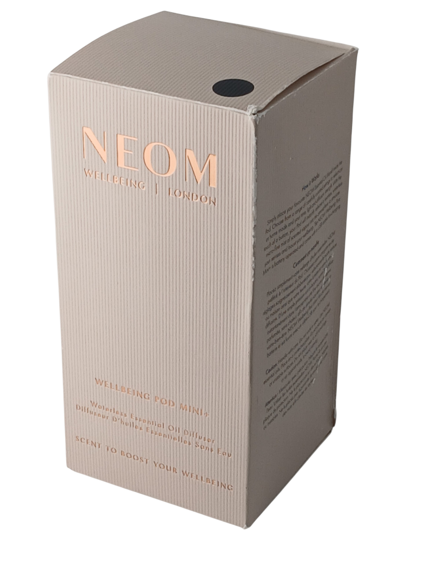 Department Store UK NEOM Wellbeing Pod Mini+ waterless essential oil diffuser packaging in a textured beige box