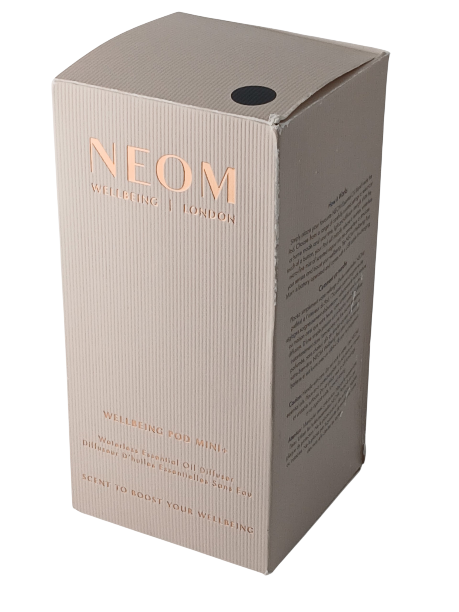 Department Store UK NEOM Wellbeing Pod Mini+ waterless essential oil diffuser packaging in a textured beige box