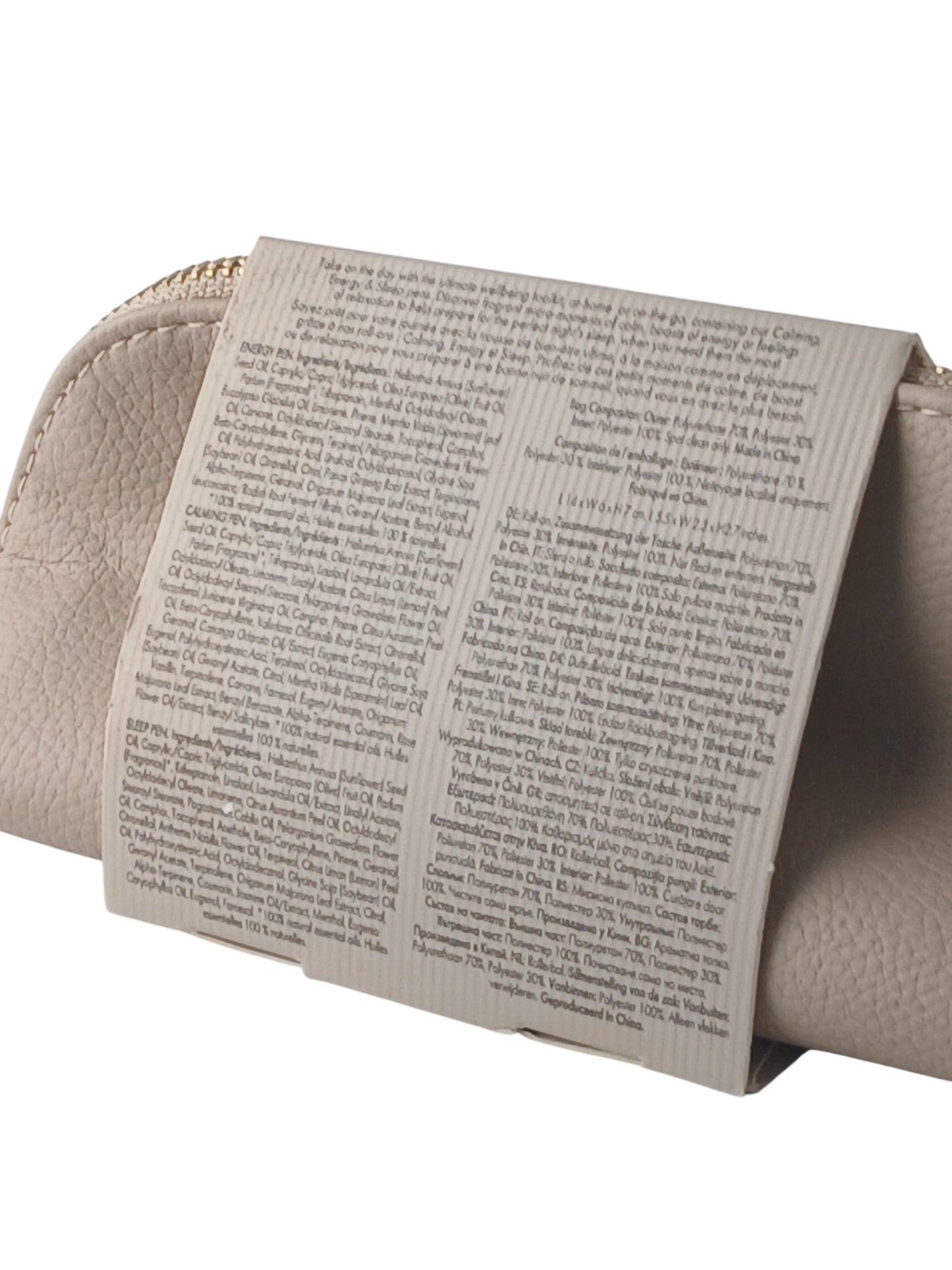 Department Store UK NEOM Wellbeing Pen Discovery Set product information label on a beige textured travel pouch