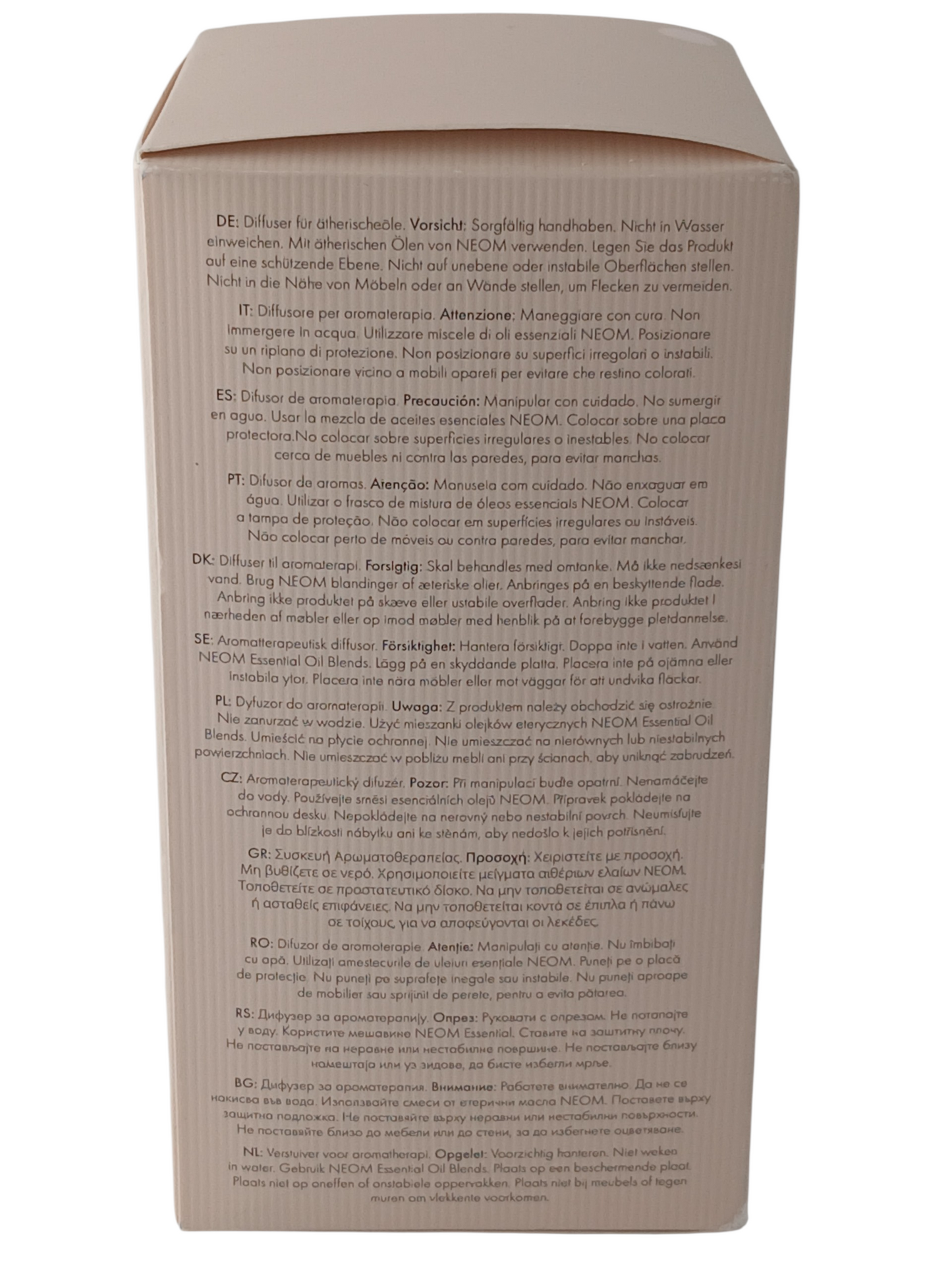 Department Store UK NEOM Wellbeing Pod Mini packaging box with multilingual safety instructions and product warnings