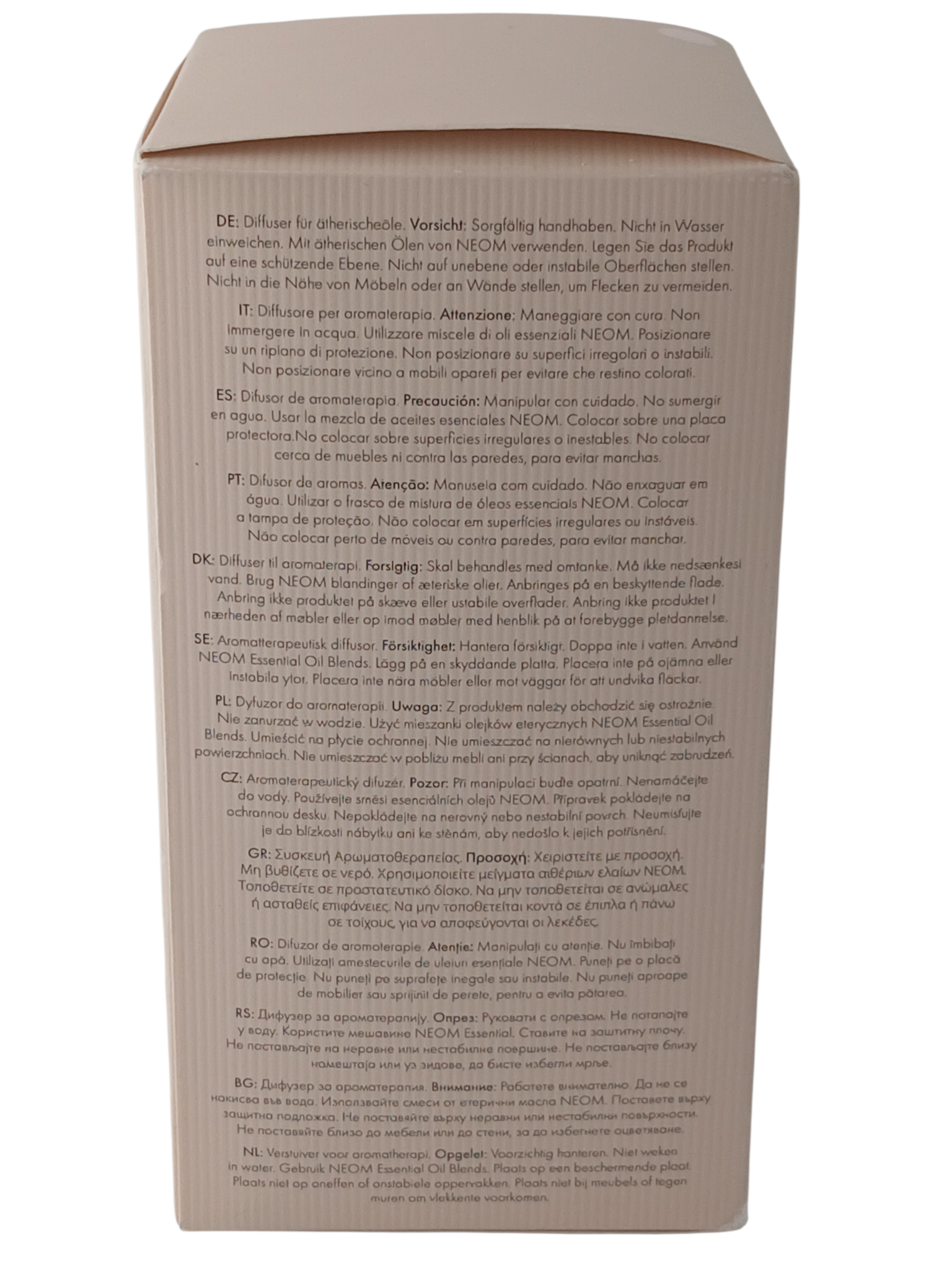 Department Store UK NEOM Wellbeing Pod Mini packaging box with multilingual safety instructions and product warnings