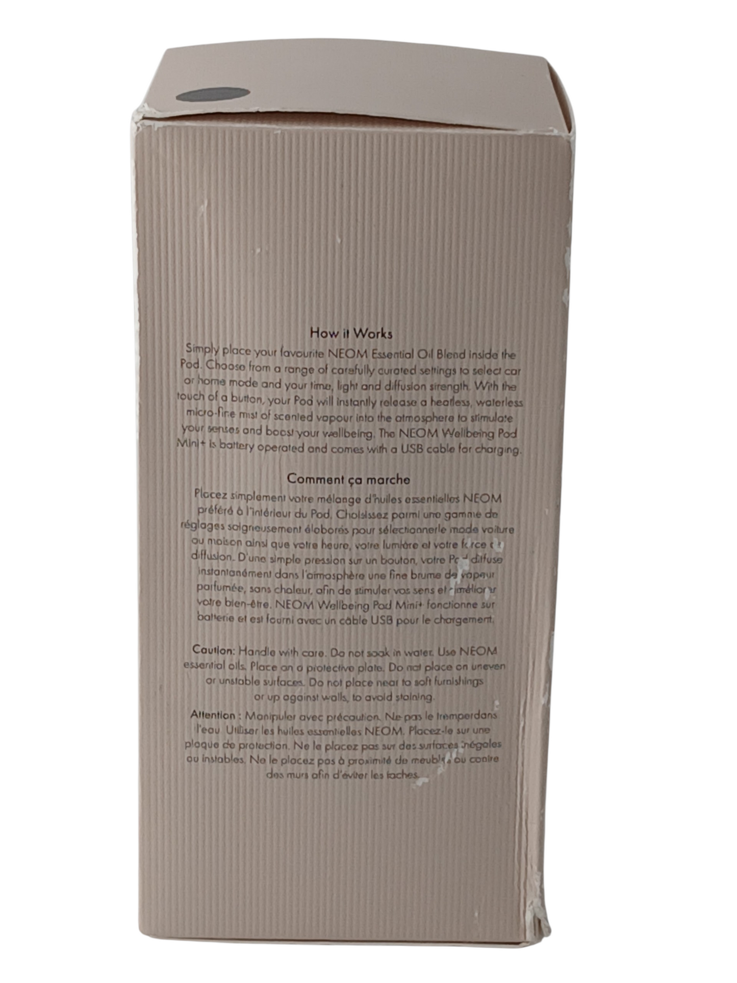 Department Store UK NEOM Wellbeing Pod Mini+ product packaging box with instructions in English and French