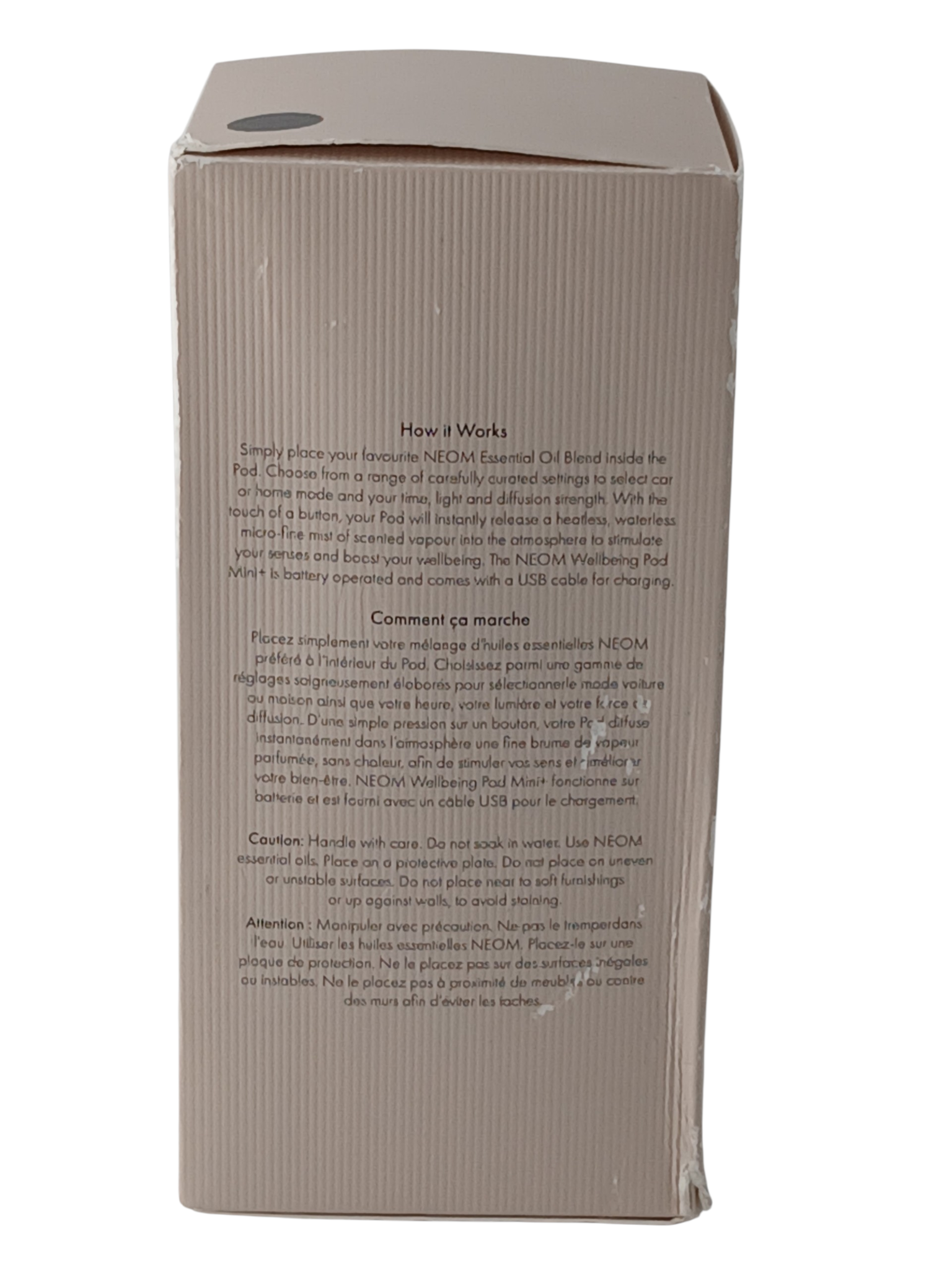 Department Store UK NEOM Wellbeing Pod Mini+ product packaging box with instructions in English and French
