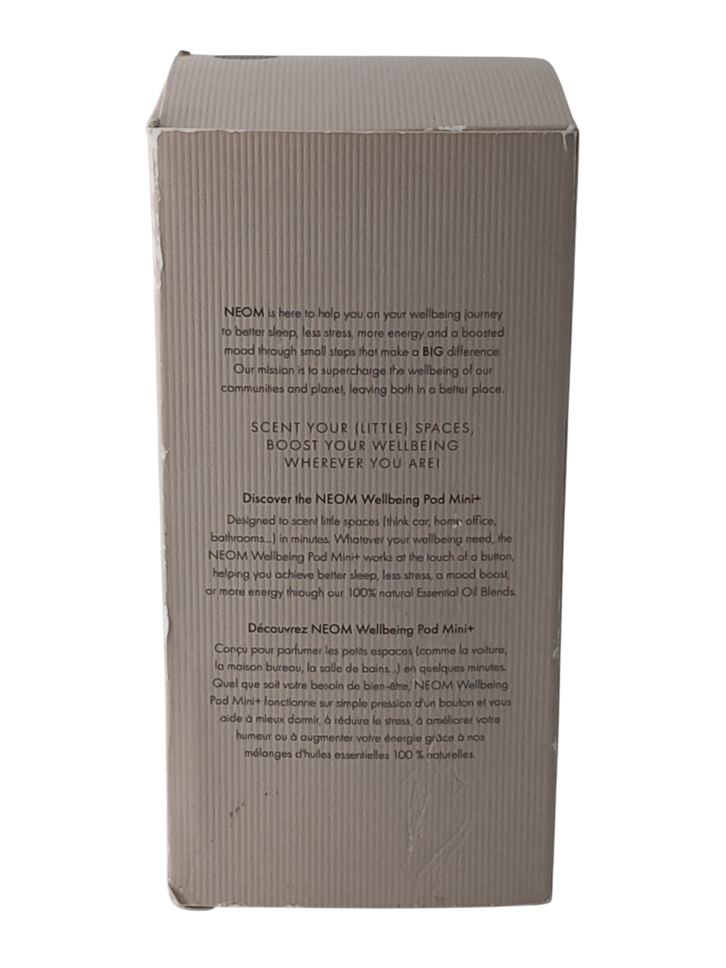 Department Store UK packaging box for NEOM Wellbeing Pod Mini+ with descriptive text about the essential oil diffuser