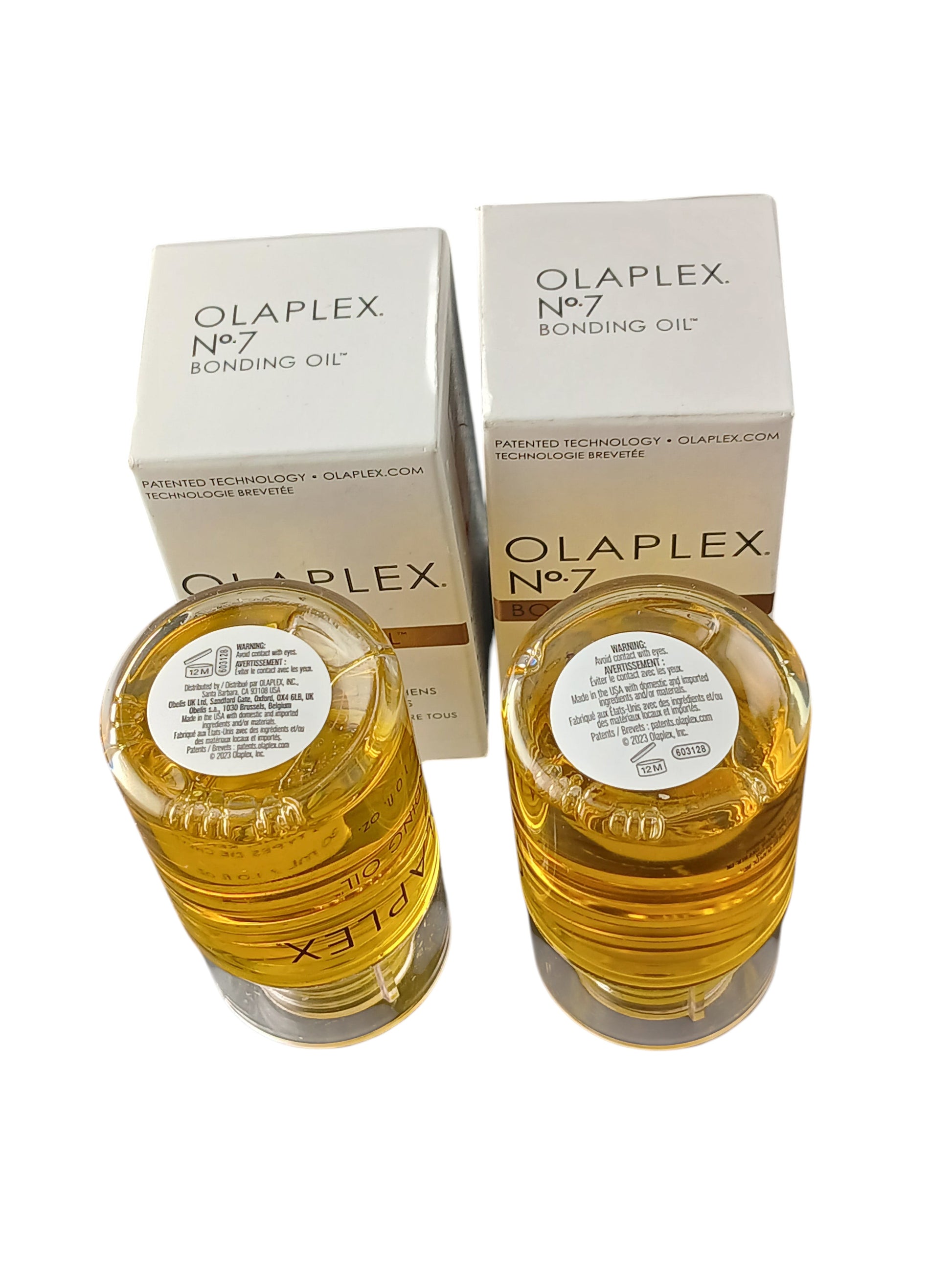 Department Store UK twin pack of Olaplex No.7 Bonding Oil bottles and boxes for hair repair and heat protection.