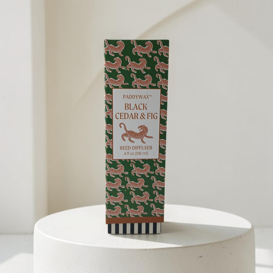 Department Store UK Paddywax Black Cedar & Fig reed diffuser in a green box with a decorative tiger pattern.