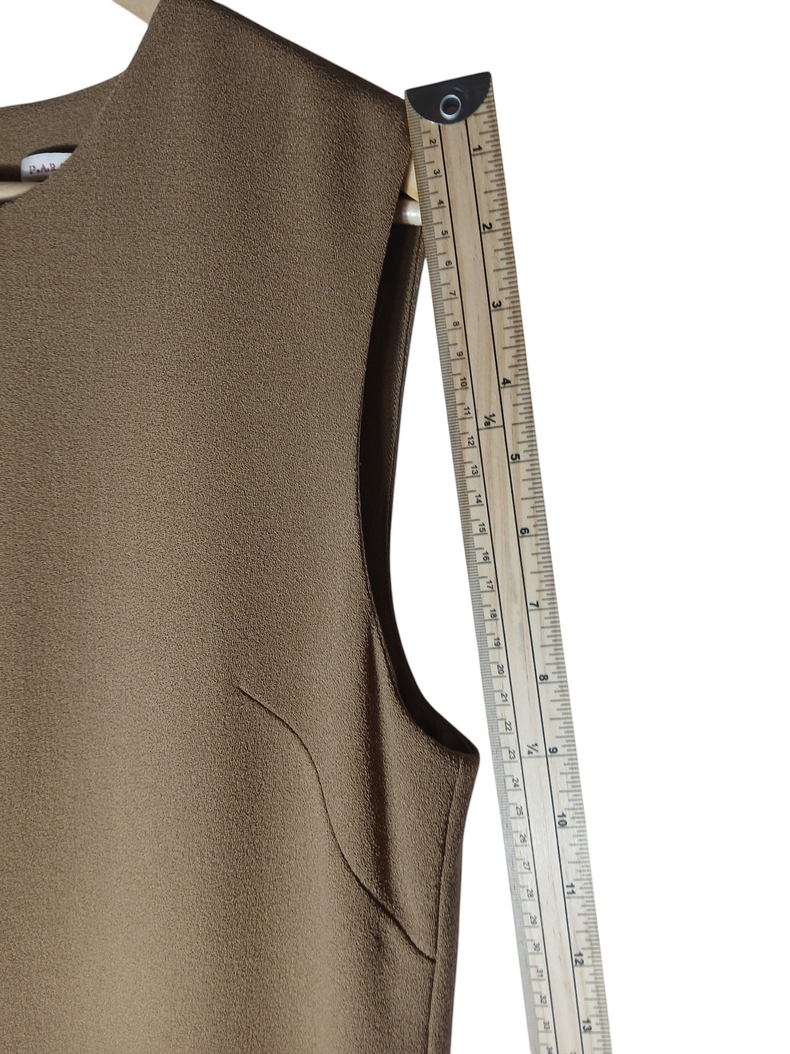 Department Store UK P.A.R.O.S.H. sleeveless camel shift dress with a wooden ruler measuring the armhole