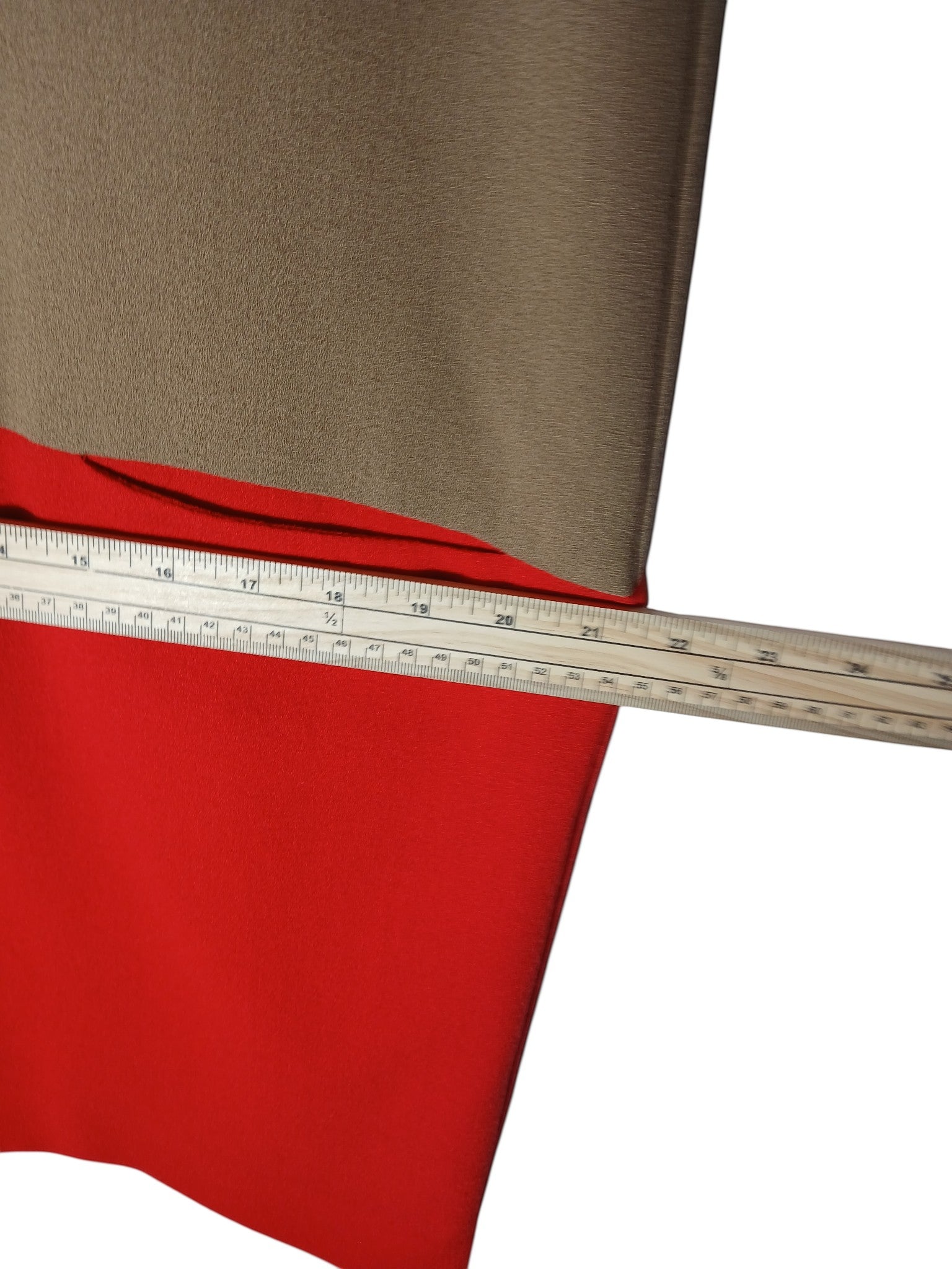 Department Store UK P.A.R.O.S.H. two-tone camel and red sleeveless shift dress being measured with a wooden ruler