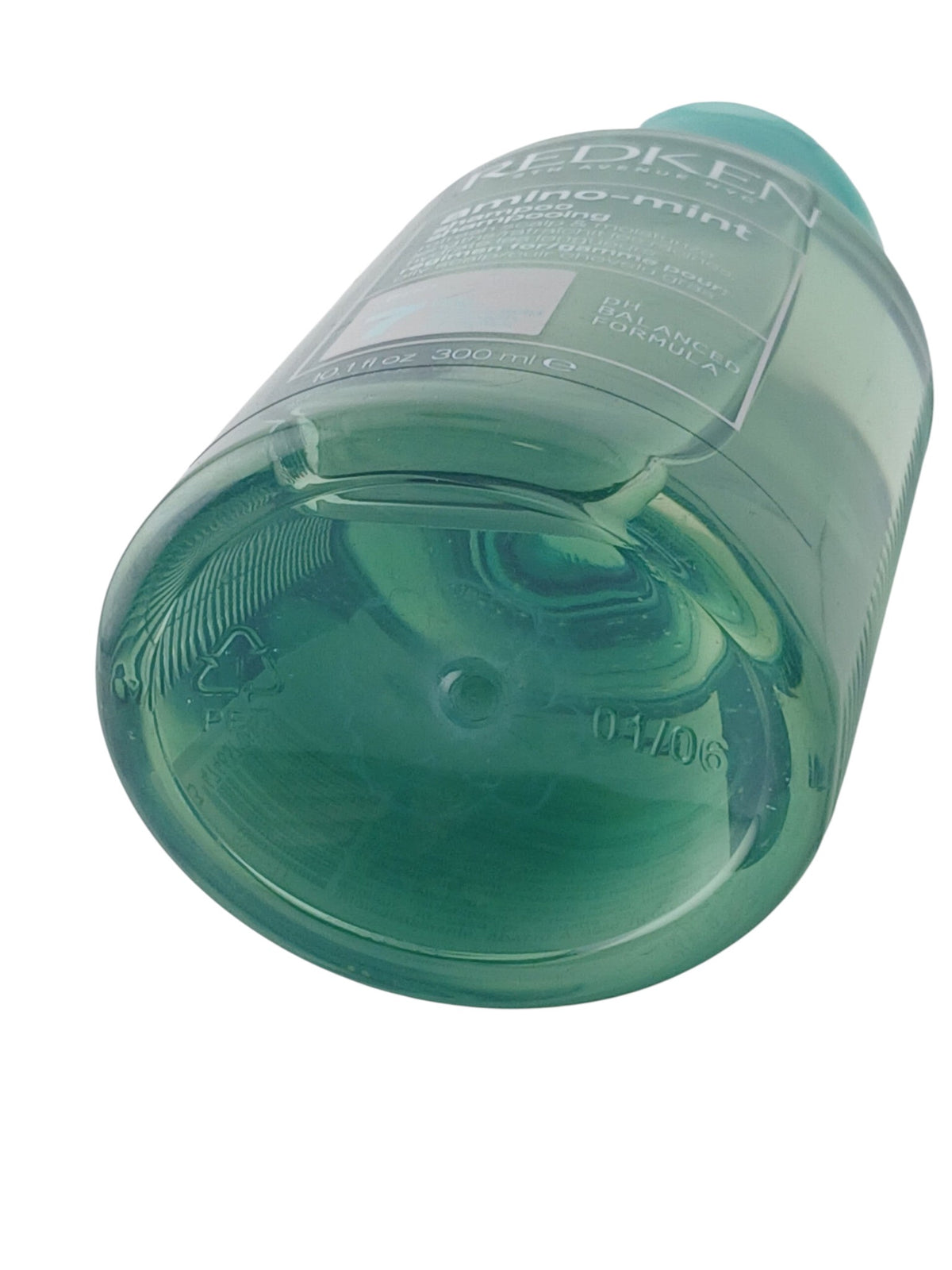 Department Store UK Redken Amino-Mint Shampoo bottle in translucent green plastic for oily scalp treatment