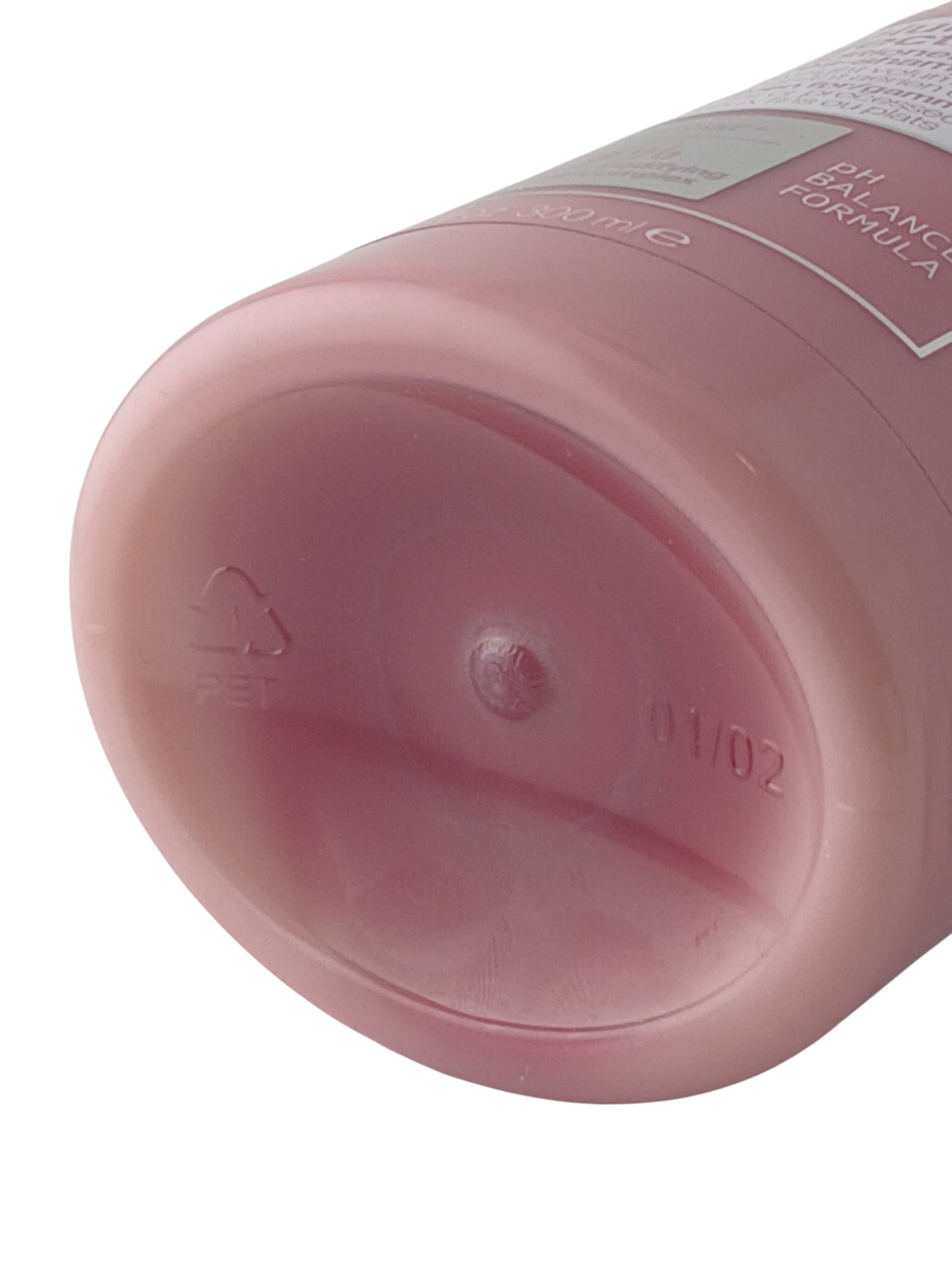Department Store UK Redken Volume Injection Conditioner bottle base showing PET recycling symbol