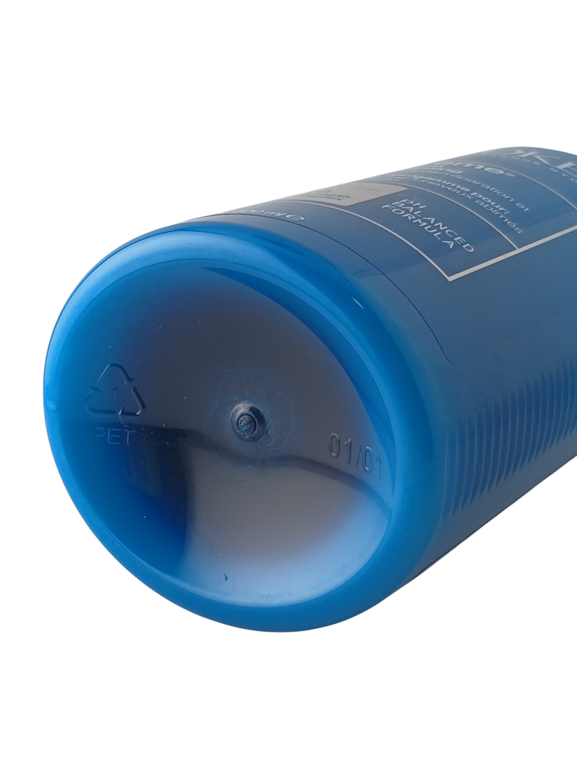 Department Store UK Redken Extreme shampoo bottle base showing PET plastic recycling symbol