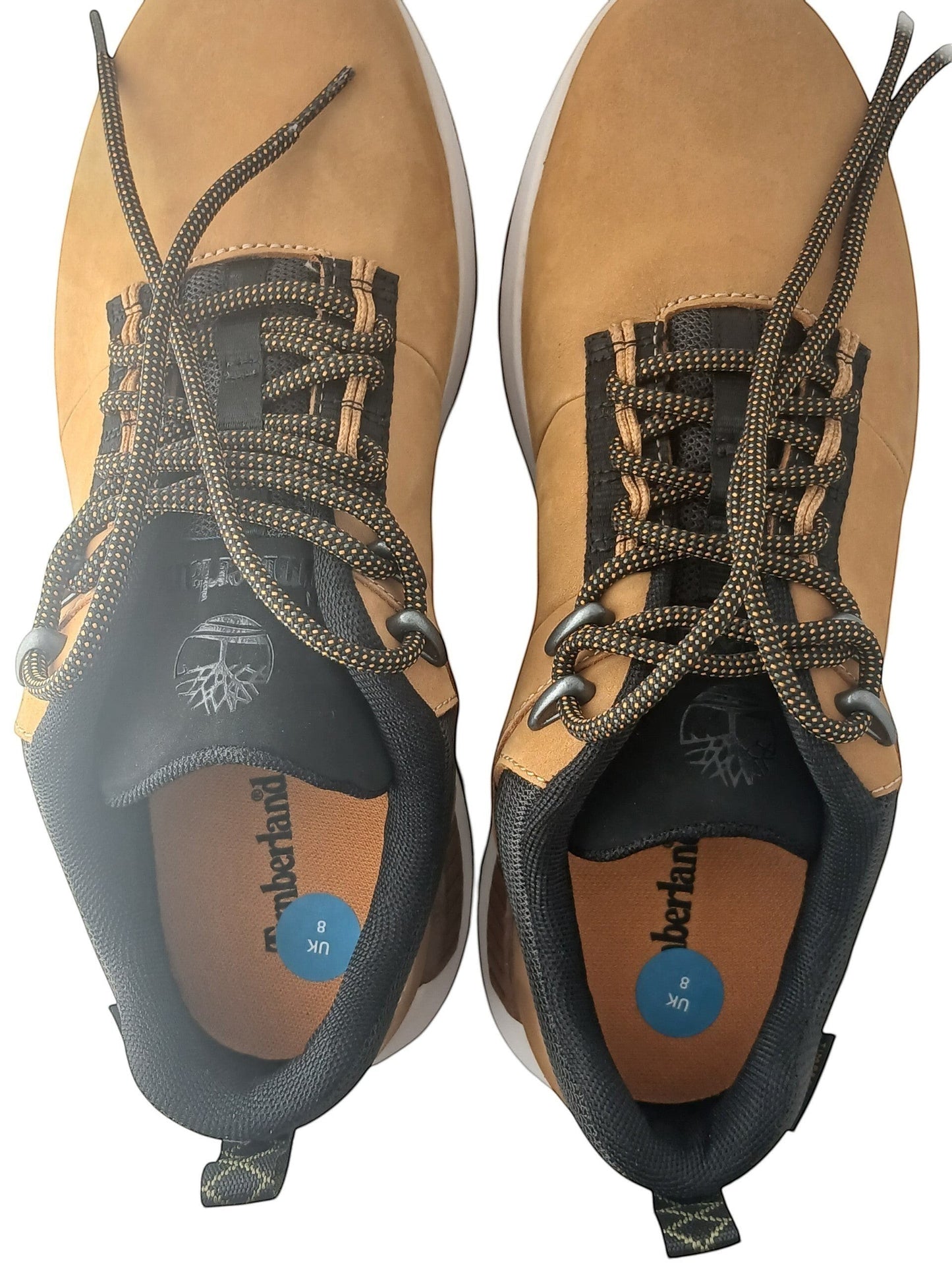Department Store UK Timberland tan nubuck leather lace-up trainers with black mesh panels and durable rubber outsoles.