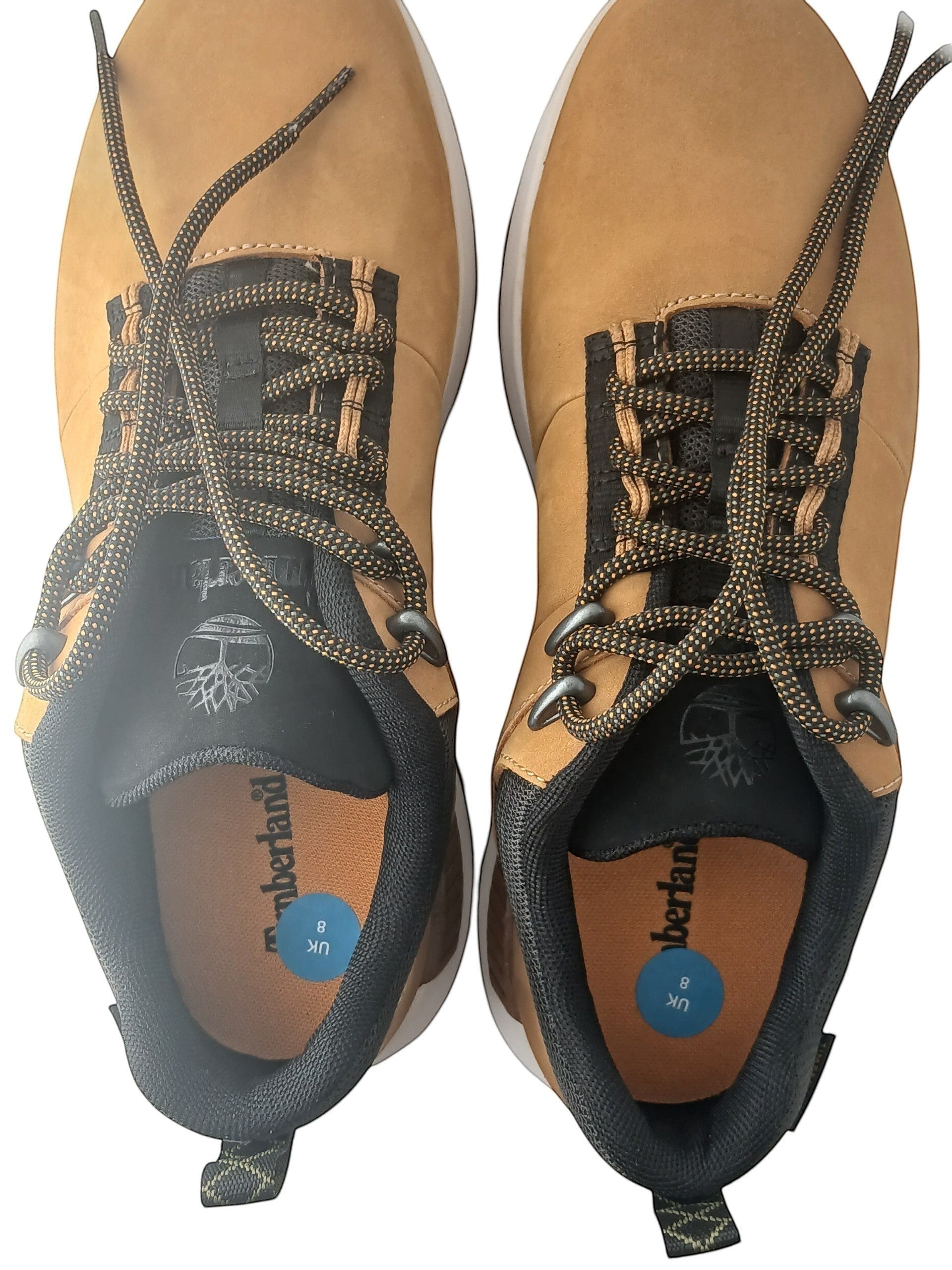 Department Store UK Timberland tan nubuck leather lace-up trainers with black mesh panels and durable rubber outsoles.