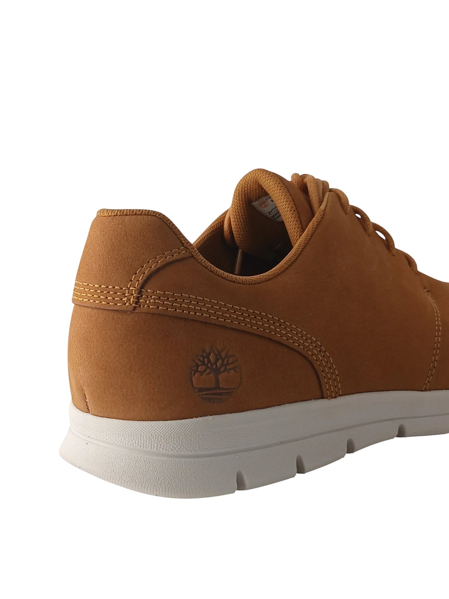 Department Store UK tan Timberland lace-up sneakers with embossed logo on heel and white HoverLite sole