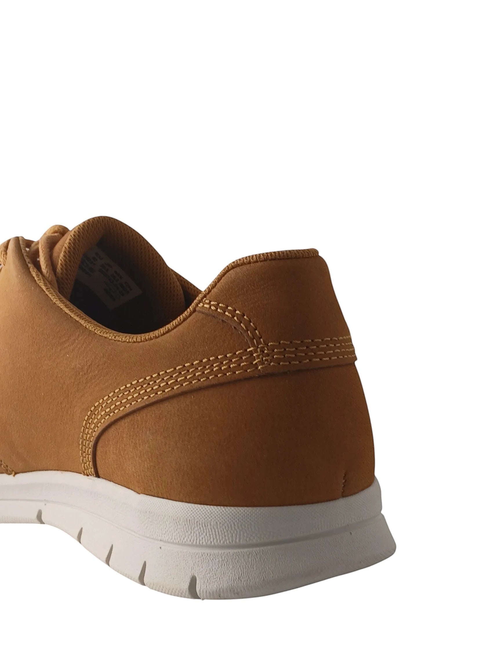 Department Store UK Timberland tan casual sneakers with a white HoverLite sole and detailed stitching on the heel