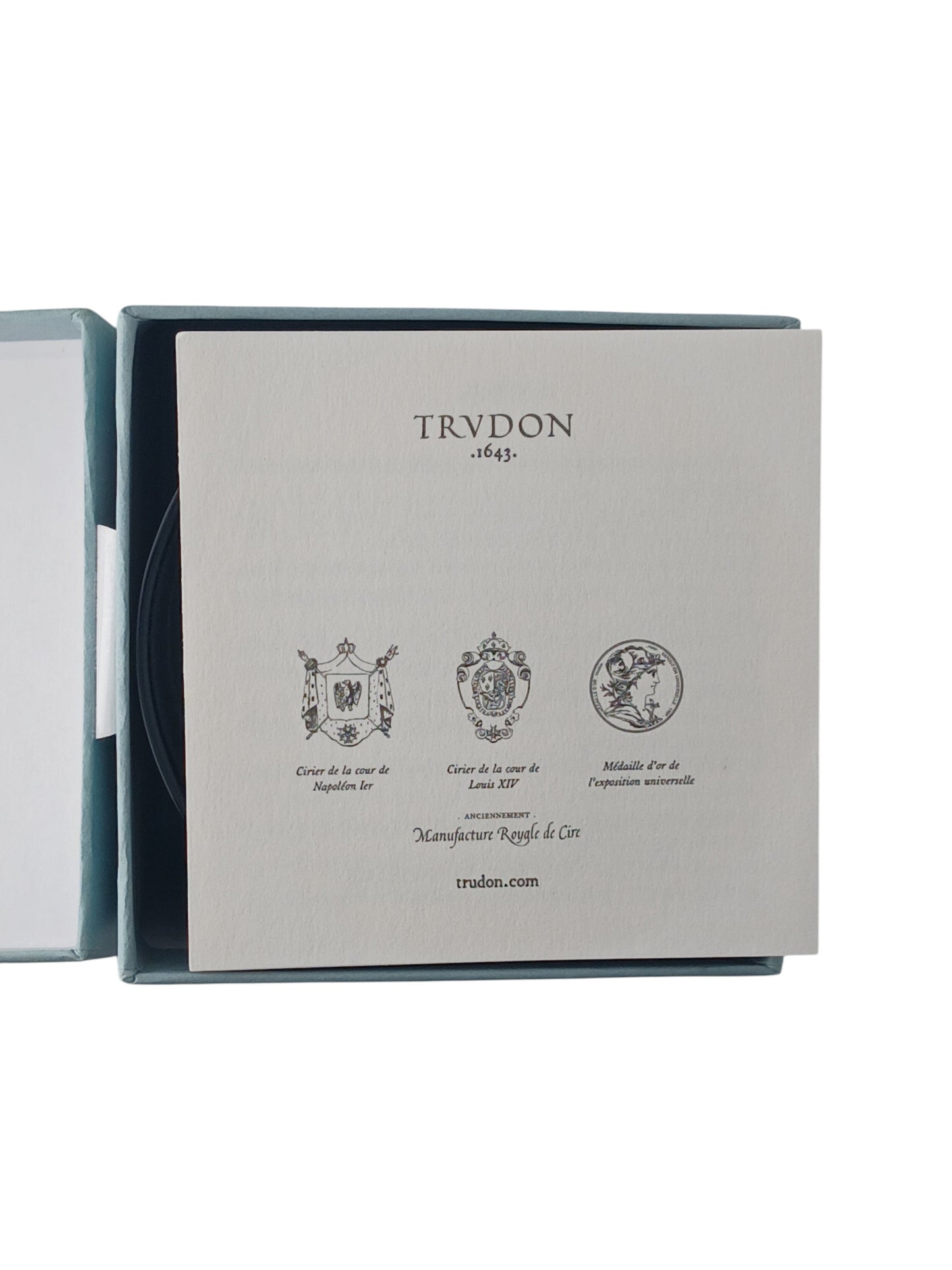 Department Store UK Trudon Gabriel scented candle packaging insert featuring historical crests and brand logo