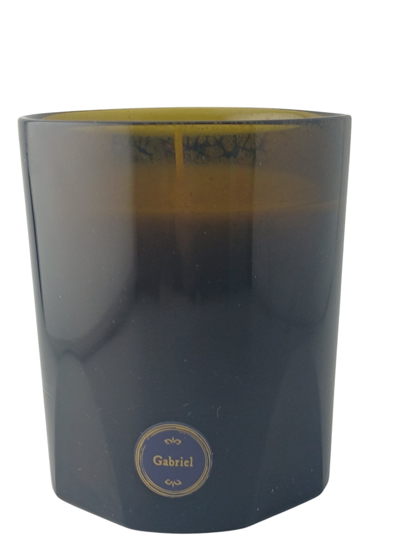 Department Store UK Trudon Gabriel scented candle in a dark green glass vessel with a signature gilded label.