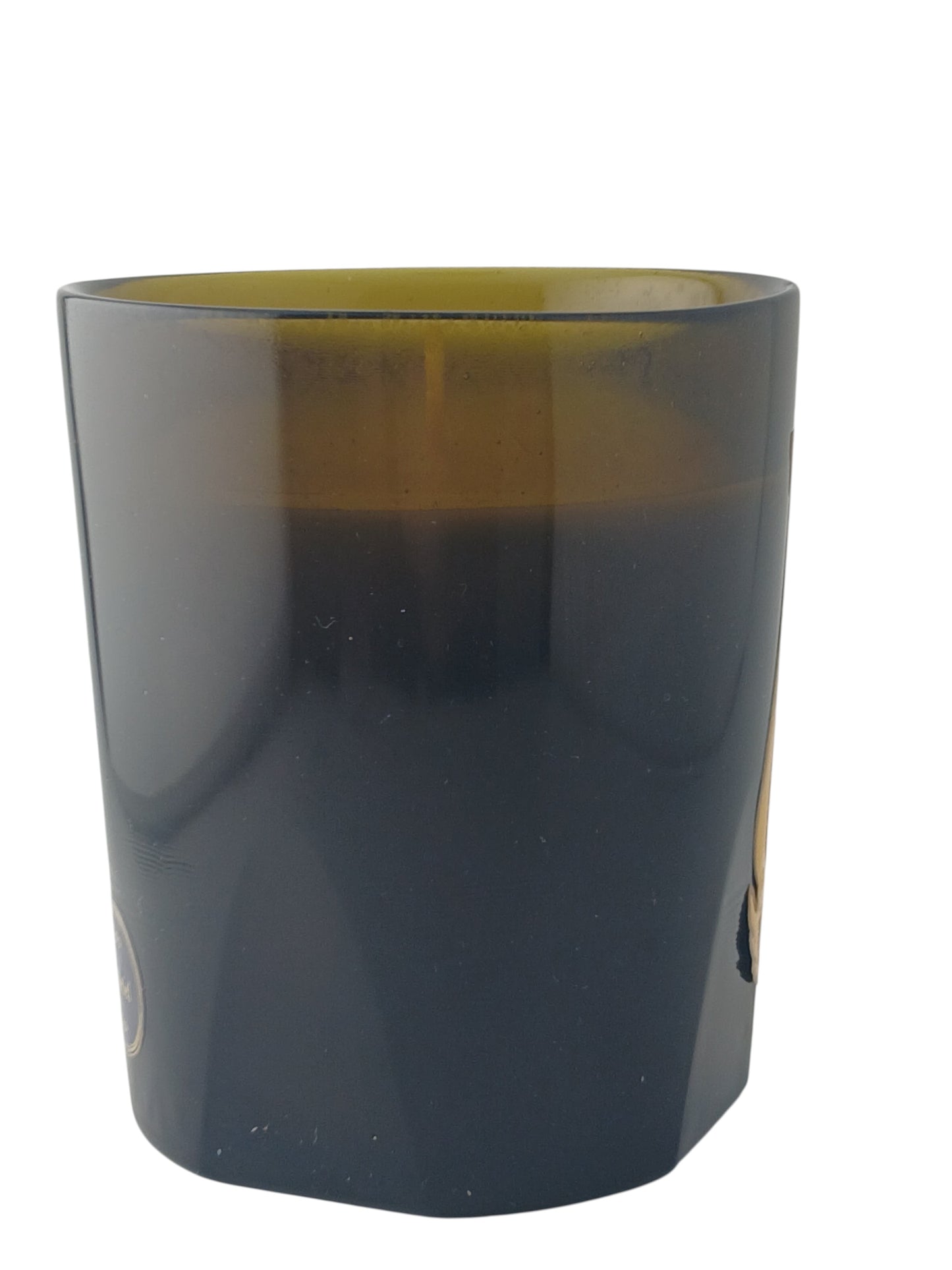 Department Store UK Trudon Gabriel scented candle in a dark green glass vessel with a signature gold label