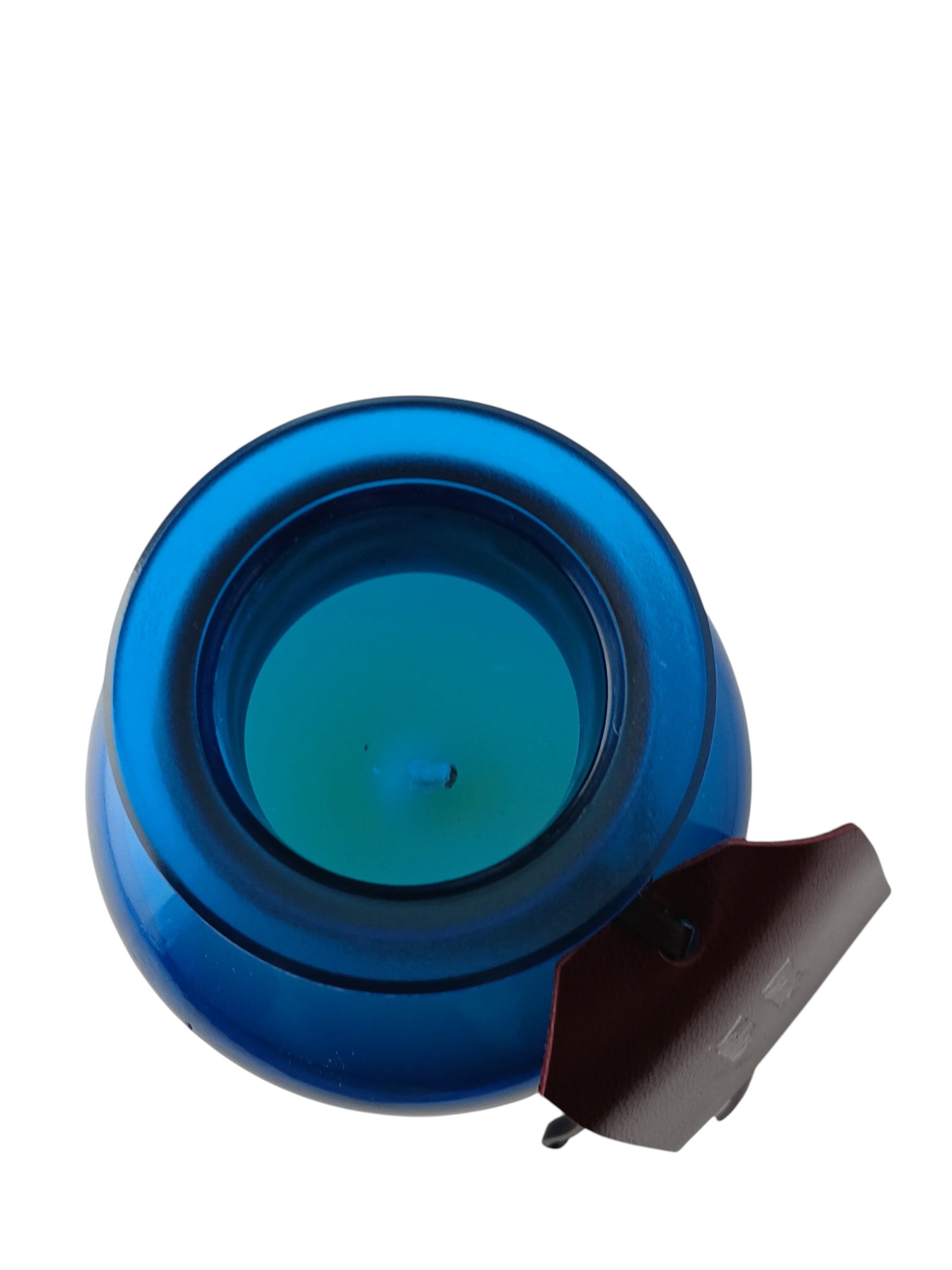 Department Store UK Atelier Cologne Vanille Nolita scented candle in a vibrant blue glass jar with a leather tag